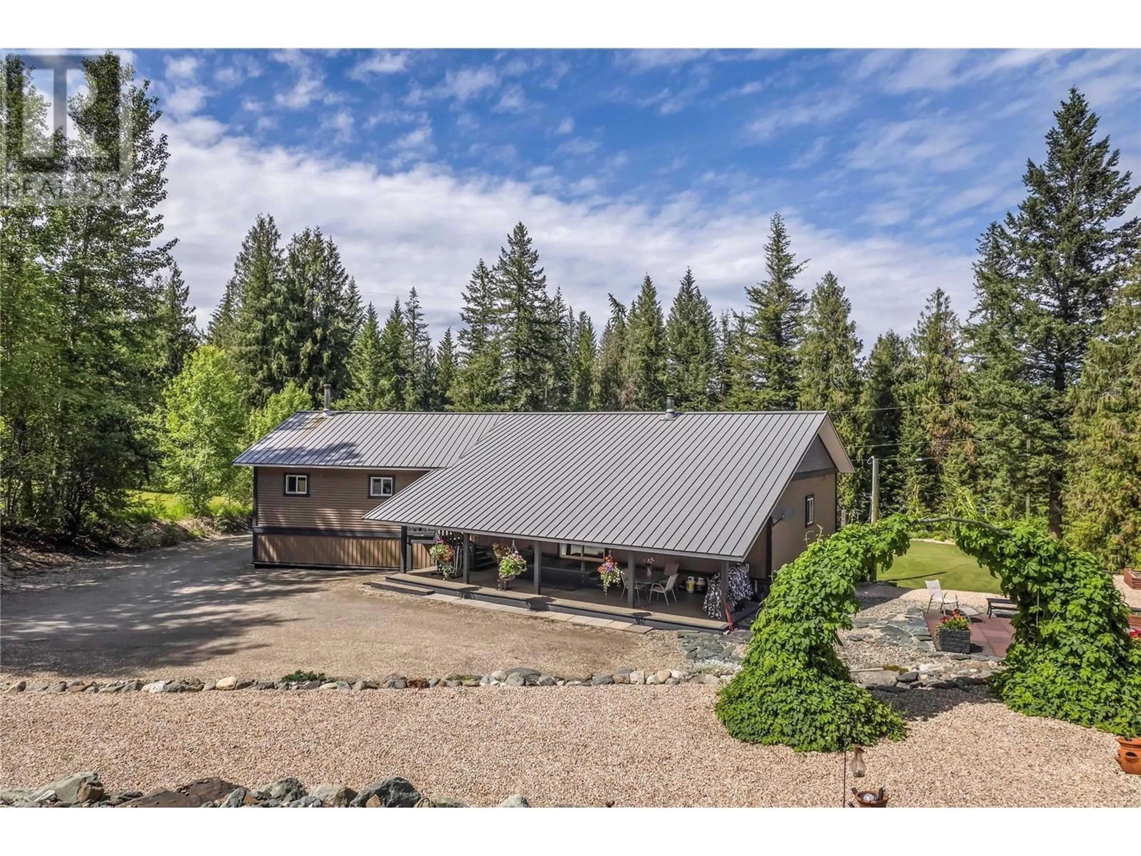 A pic from outside/outdoor area/front of a property/back of a property/a pic from drone, mountain view for 2026 Davies Road, Sorrento British Columbia V0E2W1