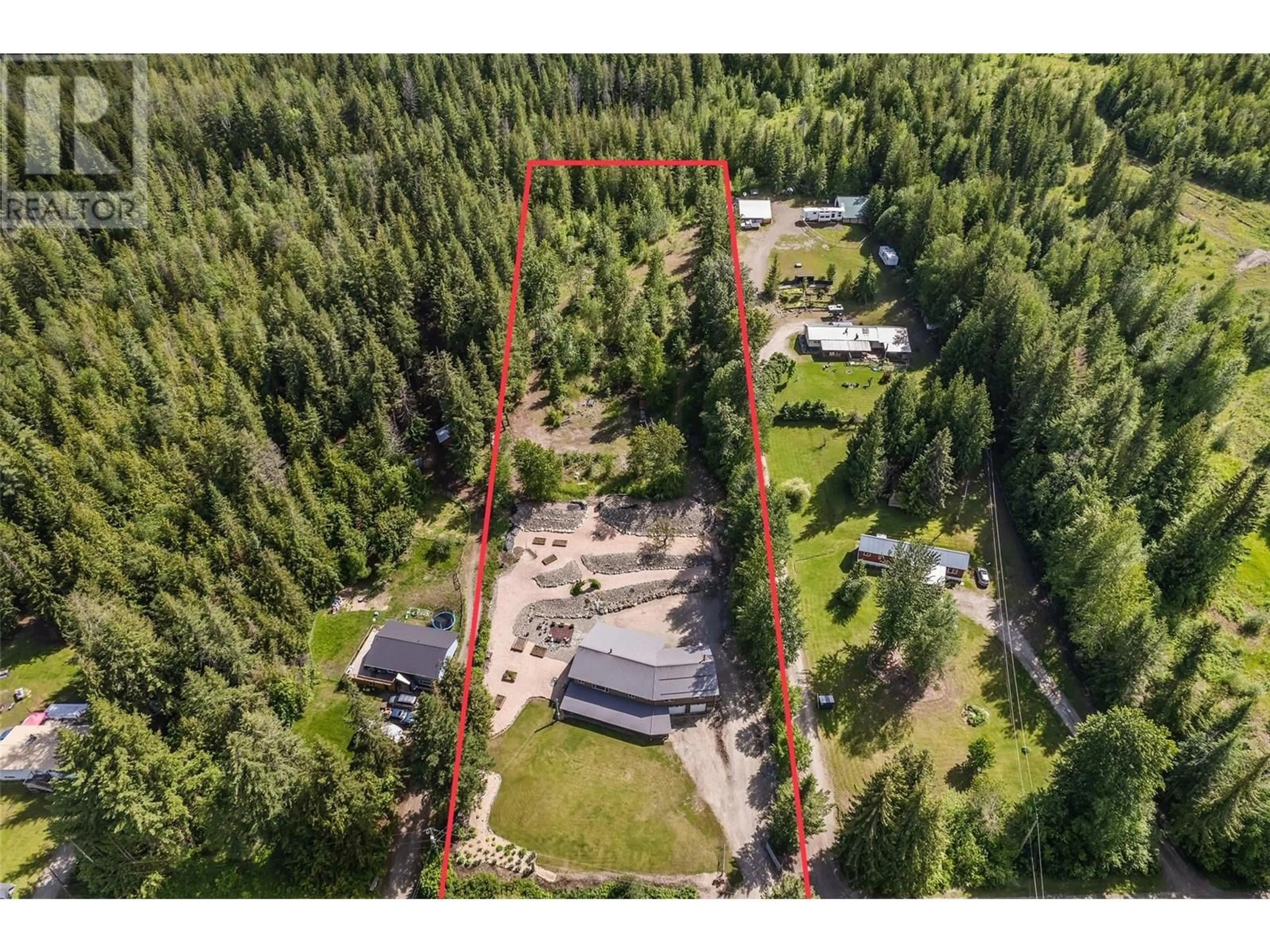 A pic from outside/outdoor area/front of a property/back of a property/a pic from drone, forest/trees view for 2026 Davies Road, Sorrento British Columbia V0E2W1