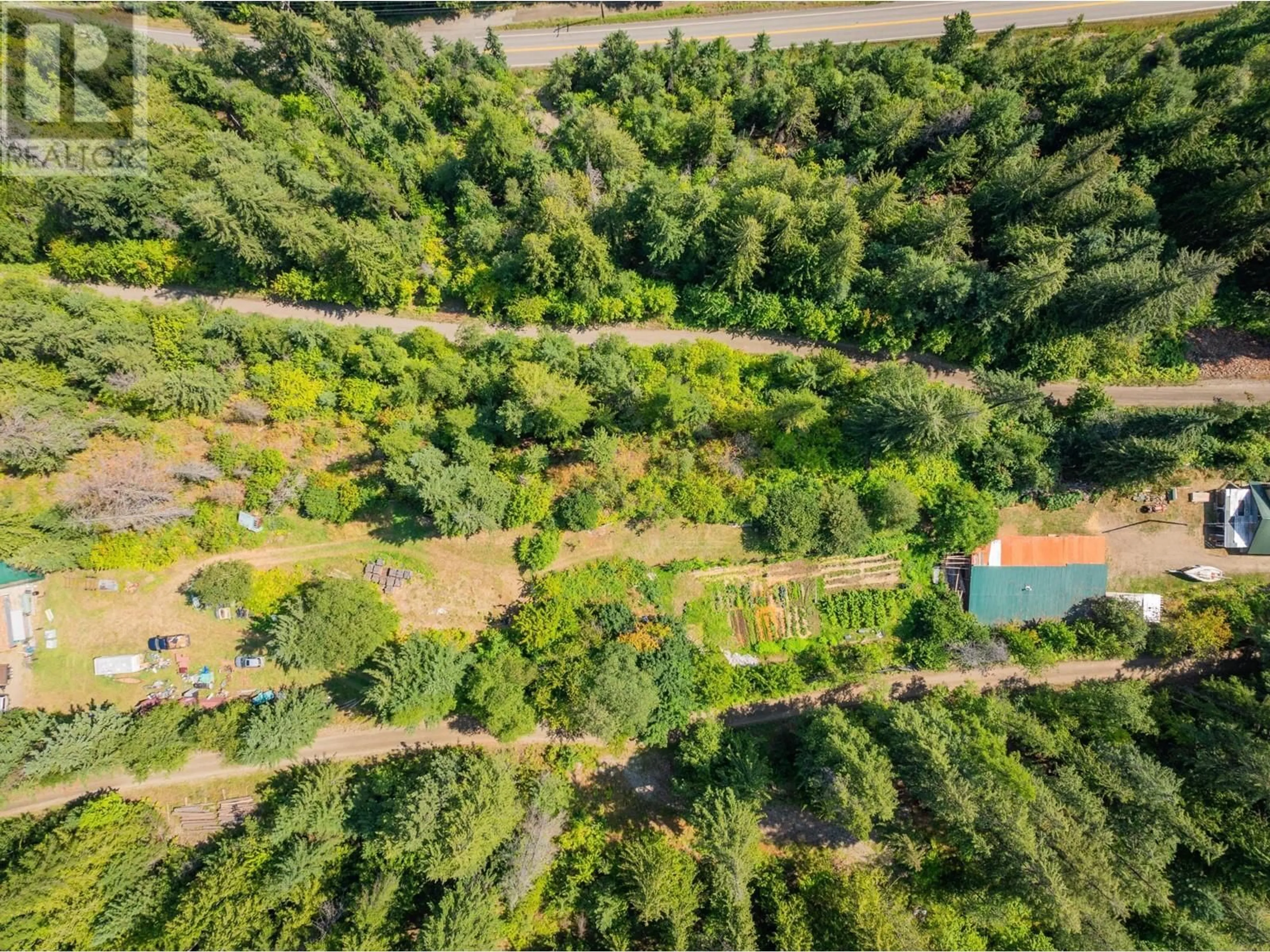 A pic from outside/outdoor area/front of a property/back of a property/a pic from drone, forest/trees view for 3430 LOON LAKE Road, Ainsworth British Columbia V0G1A0