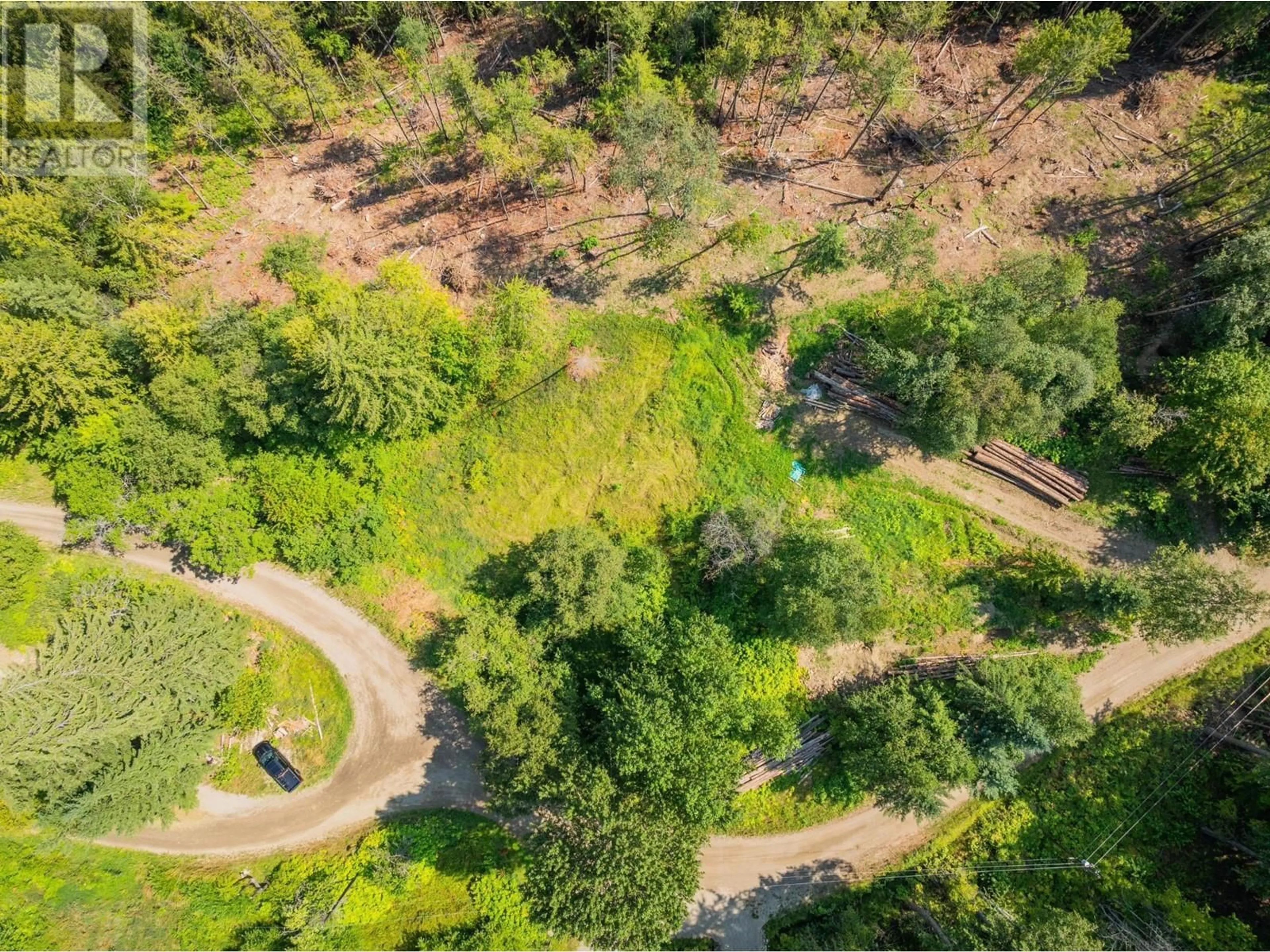 A pic from outside/outdoor area/front of a property/back of a property/a pic from drone, forest/trees view for 3430 LOON LAKE Road, Ainsworth British Columbia V0G1A0