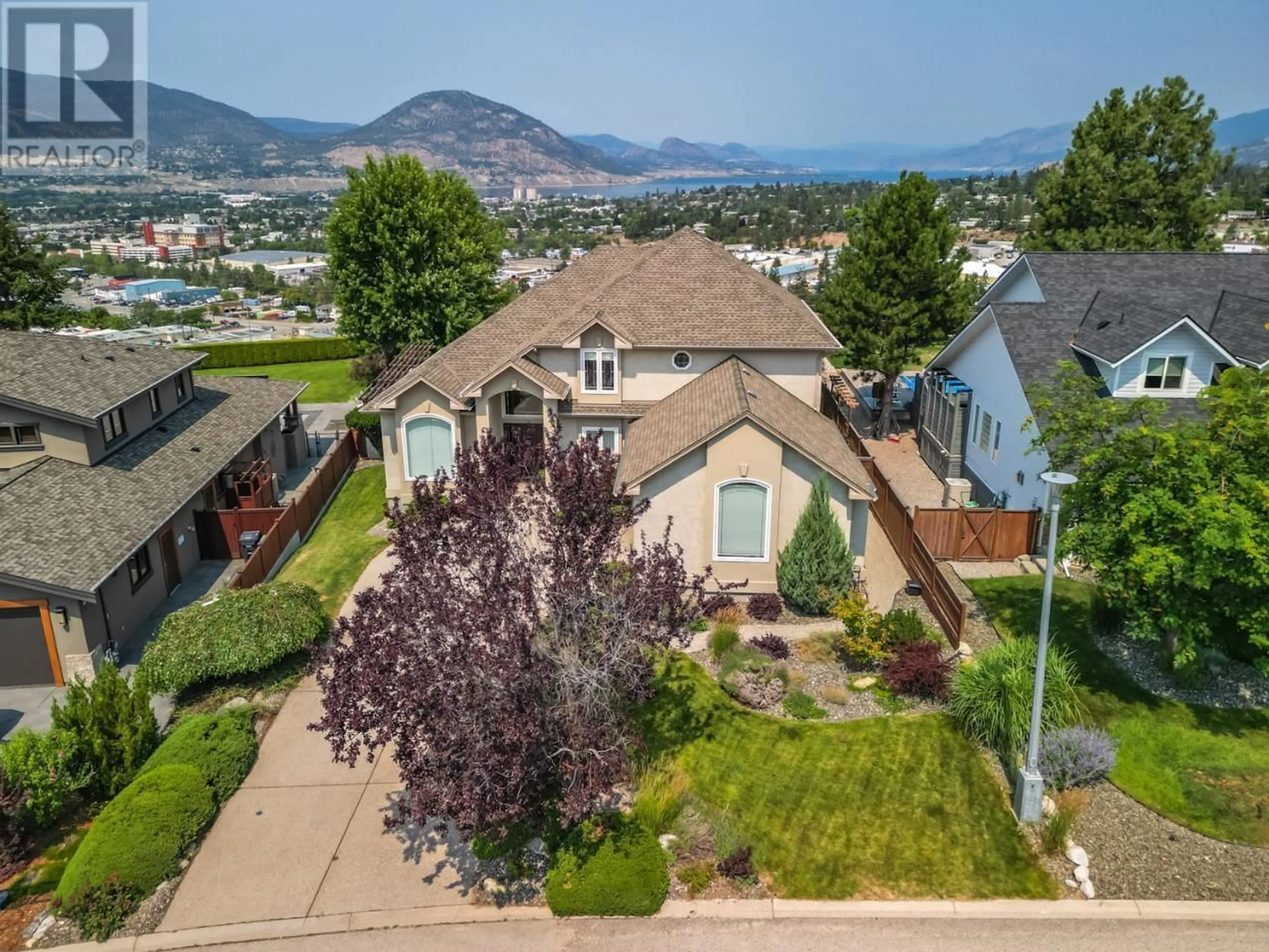 A pic from outside/outdoor area/front of a property/back of a property/a pic from drone, mountain view for 143 Westview Drive, Penticton British Columbia V2A7V9