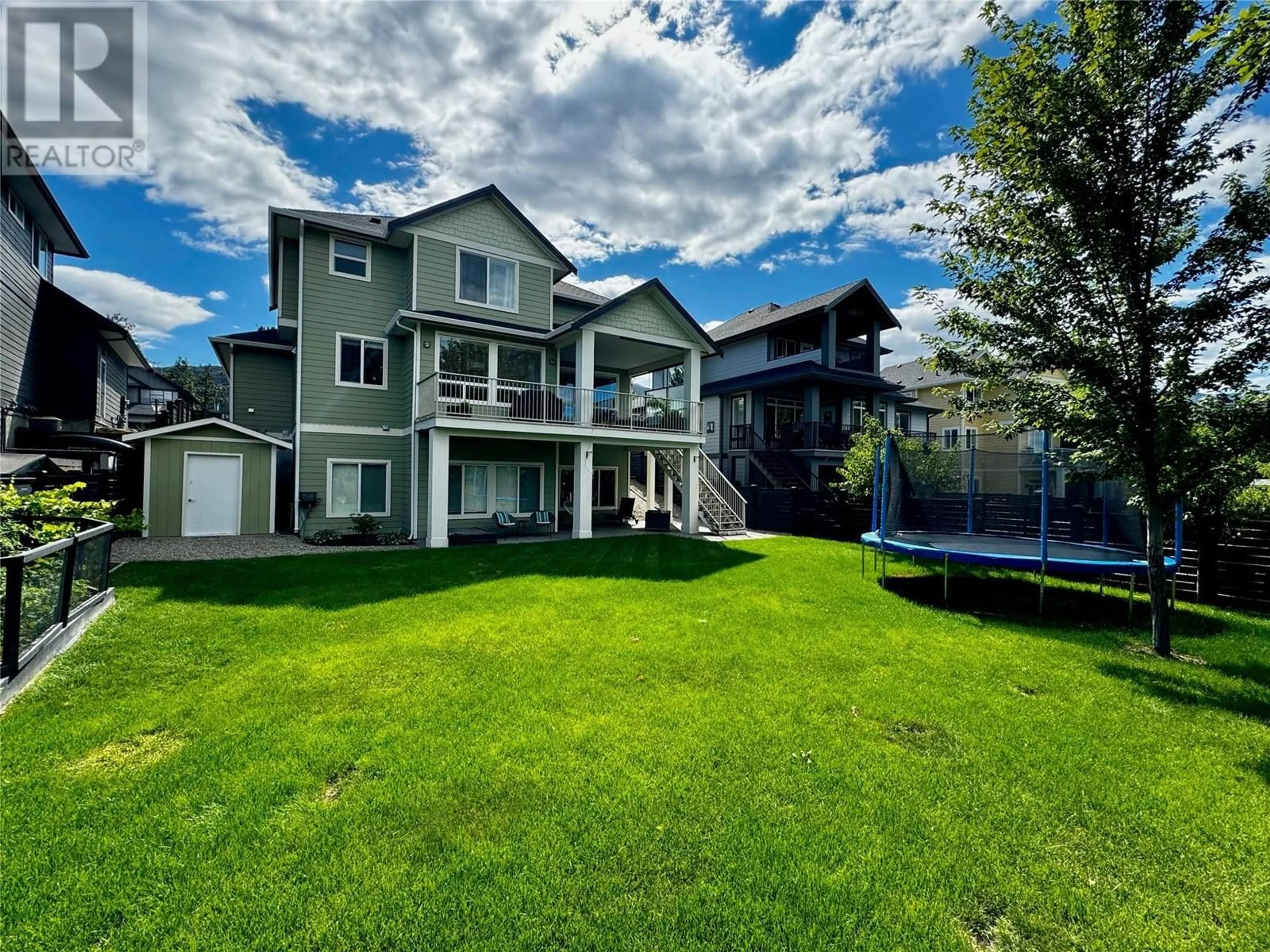 A pic from outside/outdoor area/front of a property/back of a property/a pic from drone, water/lake/river/ocean view for 515 Wren Place Unit# 126, Kelowna British Columbia V1W5H7