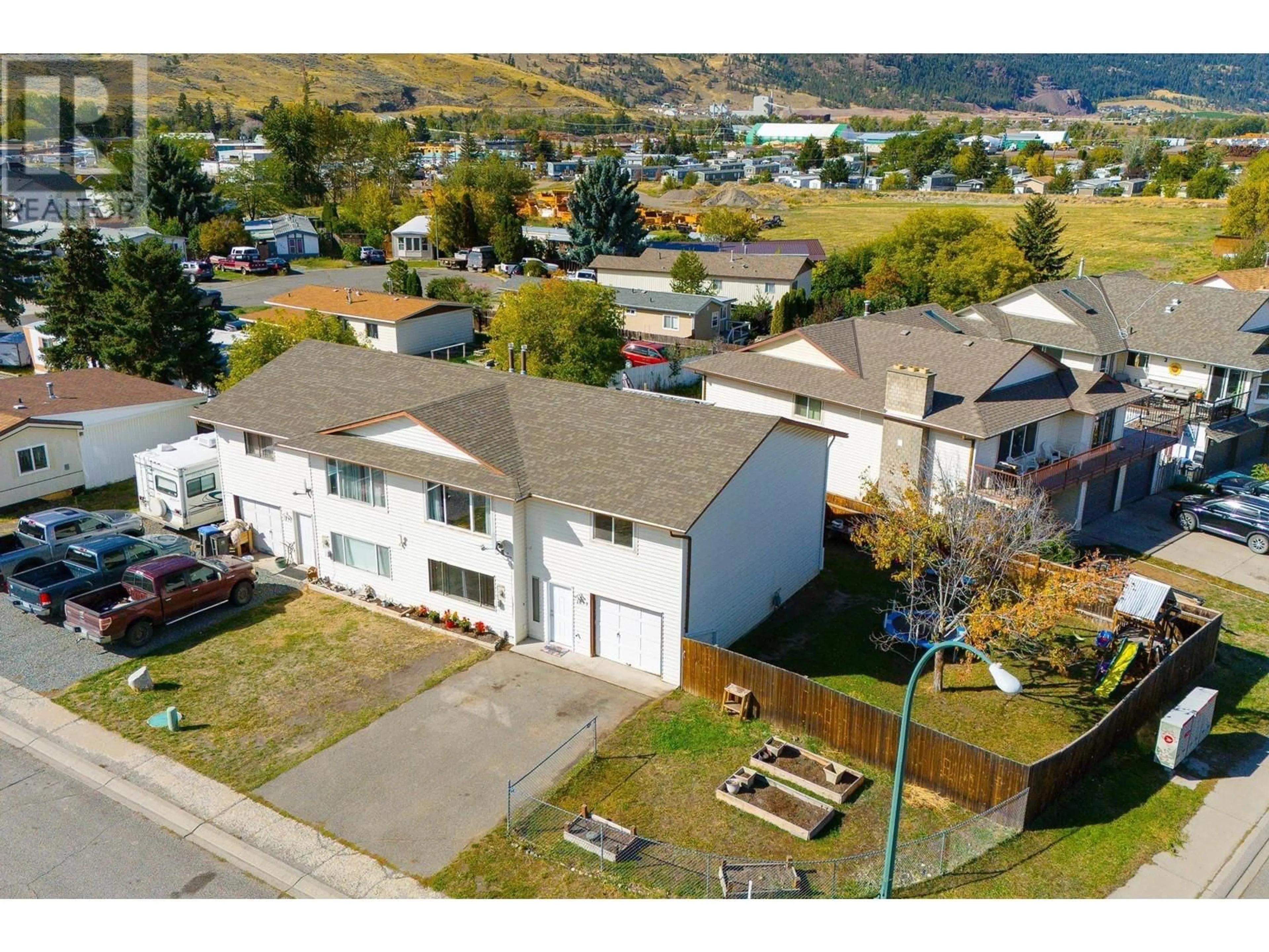 A pic from outside/outdoor area/front of a property/back of a property/a pic from drone, mountain view for 1899 SAGE Street, Merritt British Columbia V1K1G3