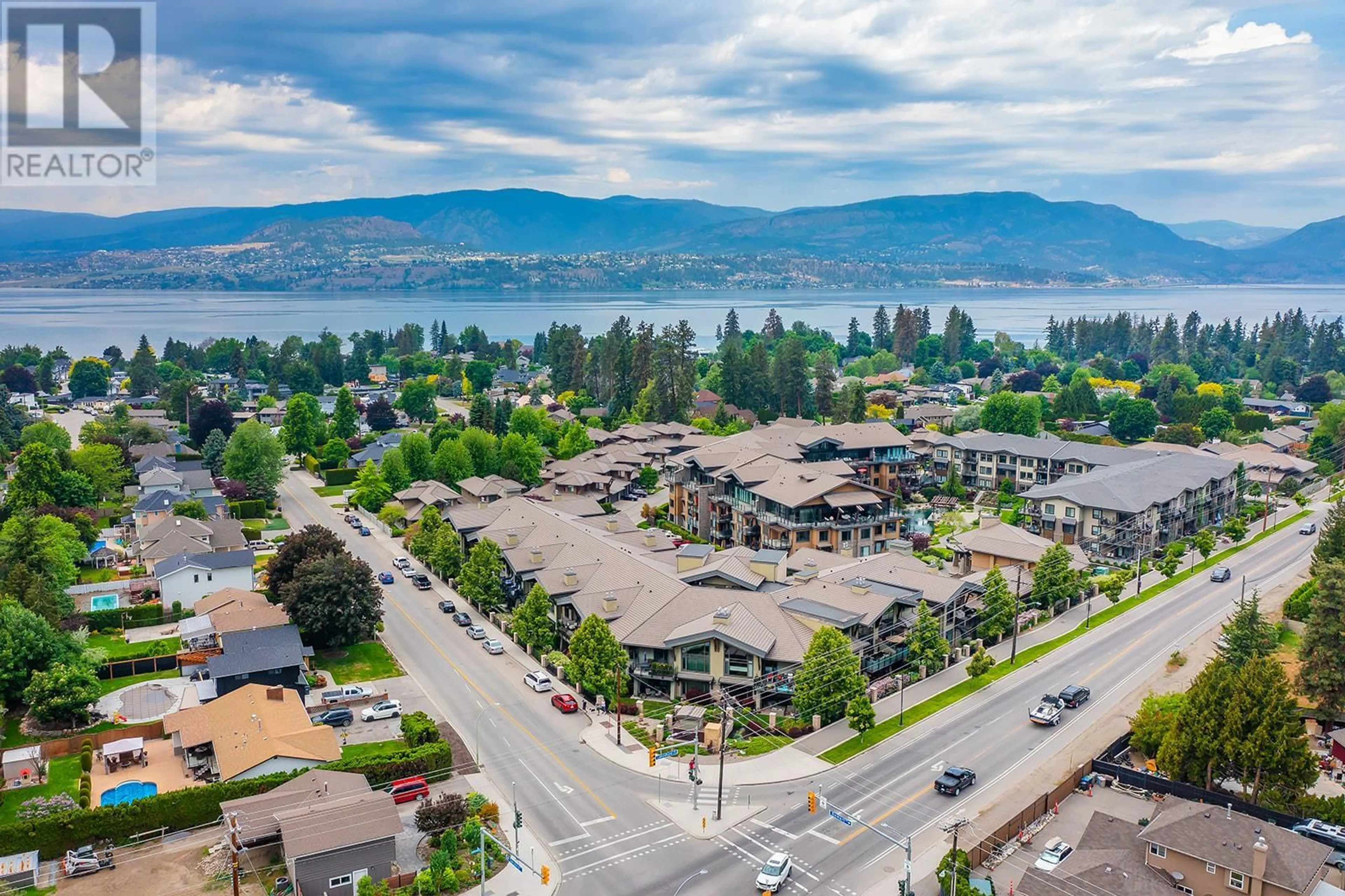 A pic from outside/outdoor area/front of a property/back of a property/a pic from drone, mountain view for 580 Sarsons Road Unit# 309, Kelowna British Columbia V1W5H5