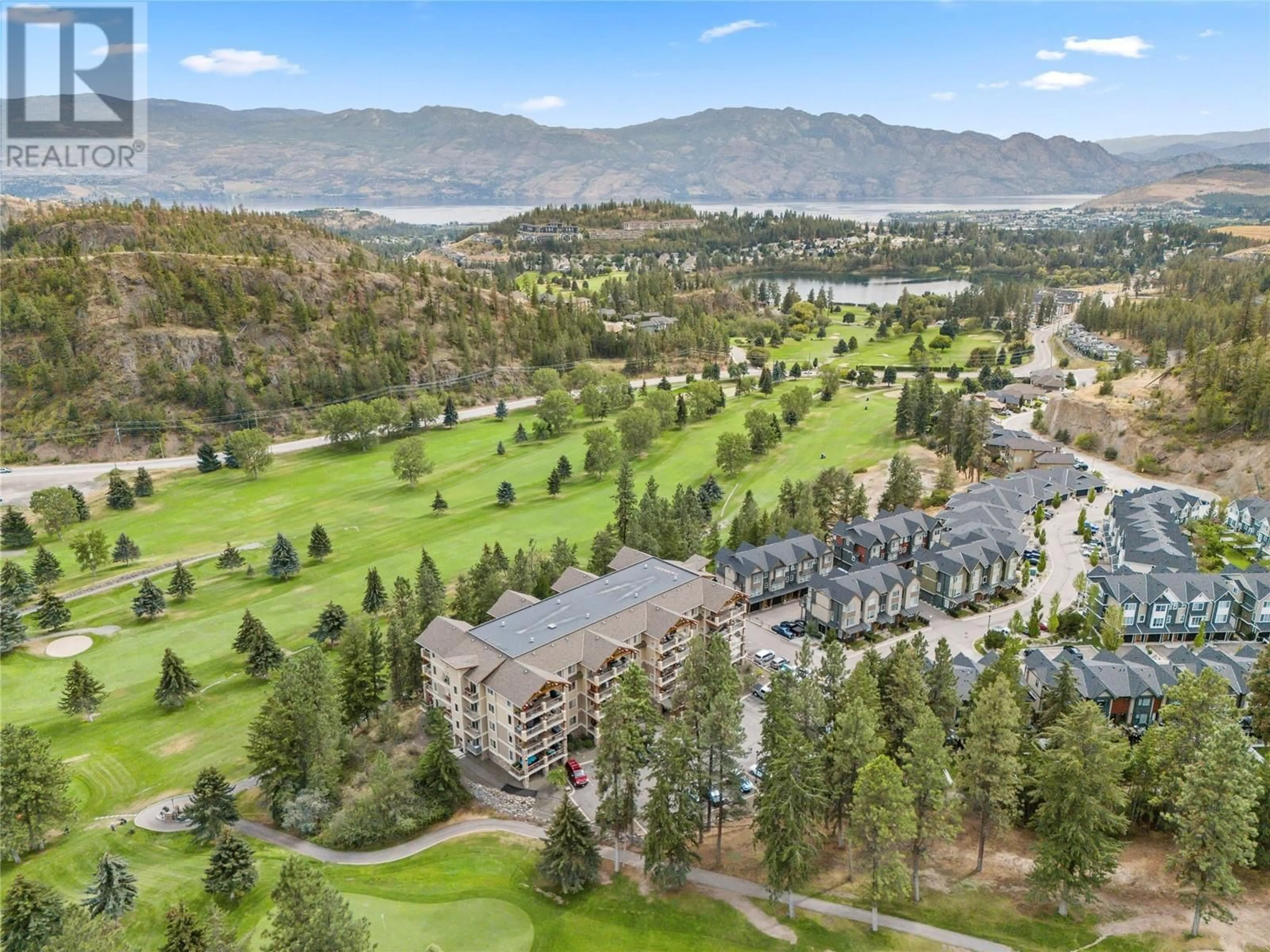 A pic from outside/outdoor area/front of a property/back of a property/a pic from drone, mountain view for 2470 Tuscany Drive Unit# 201, West Kelowna British Columbia V4T3G8