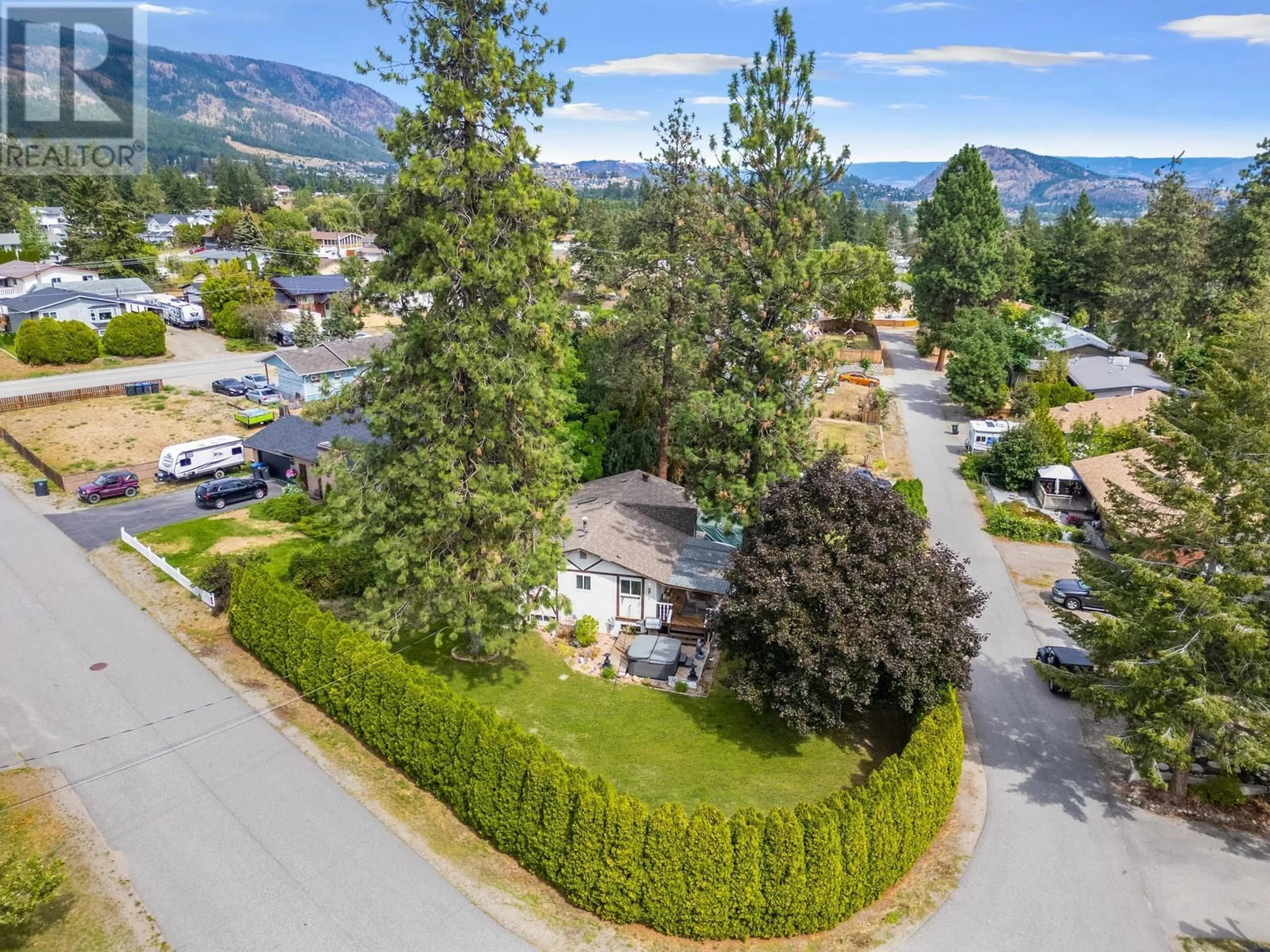 A pic from outside/outdoor area/front of a property/back of a property/a pic from drone, mountain view for 3565 Glasgow Road, West Kelowna British Columbia V4T1J7