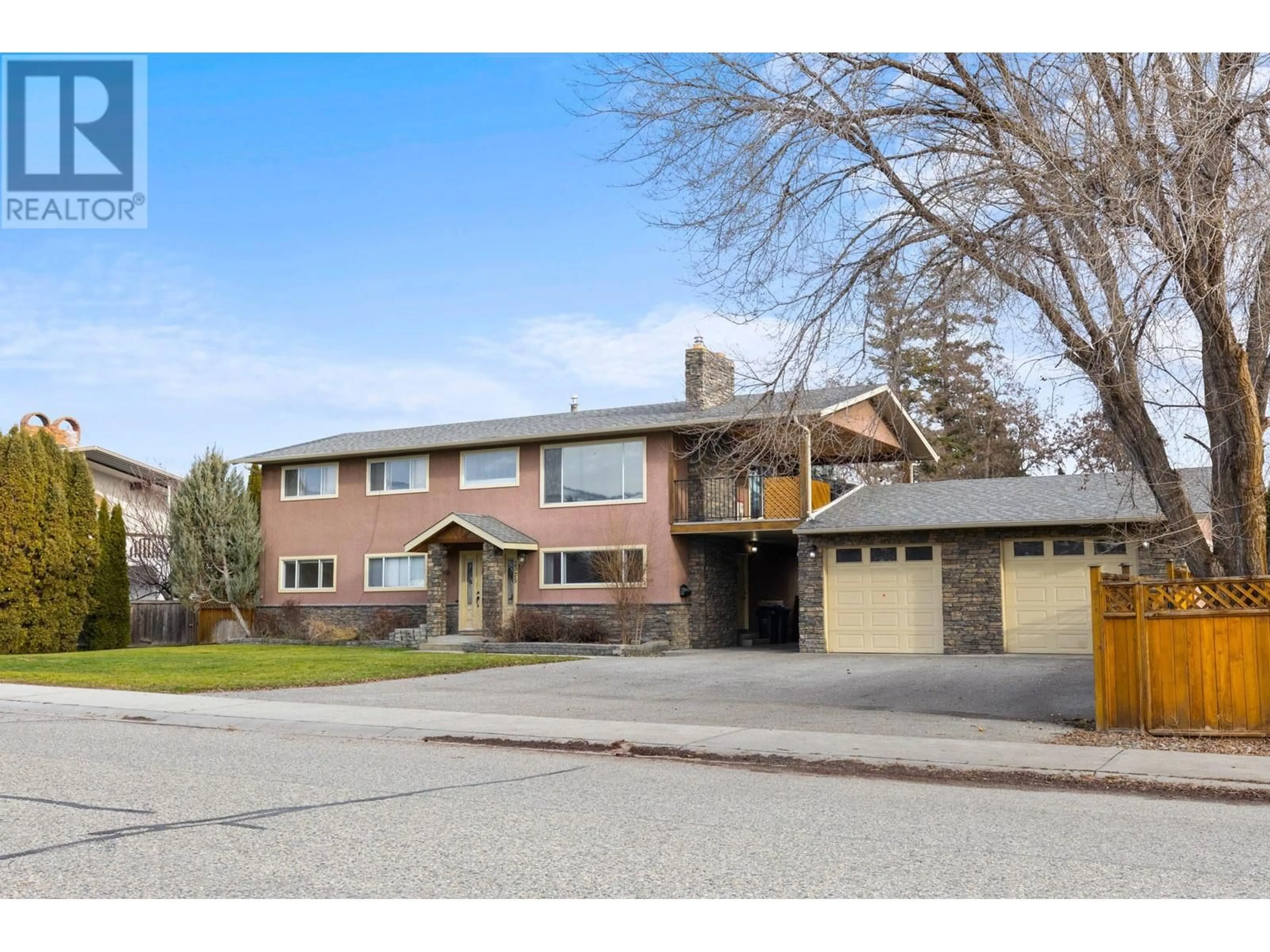 Home with brick exterior material, street for 2375 Charolais Road, Kelowna British Columbia V1Y7Y8