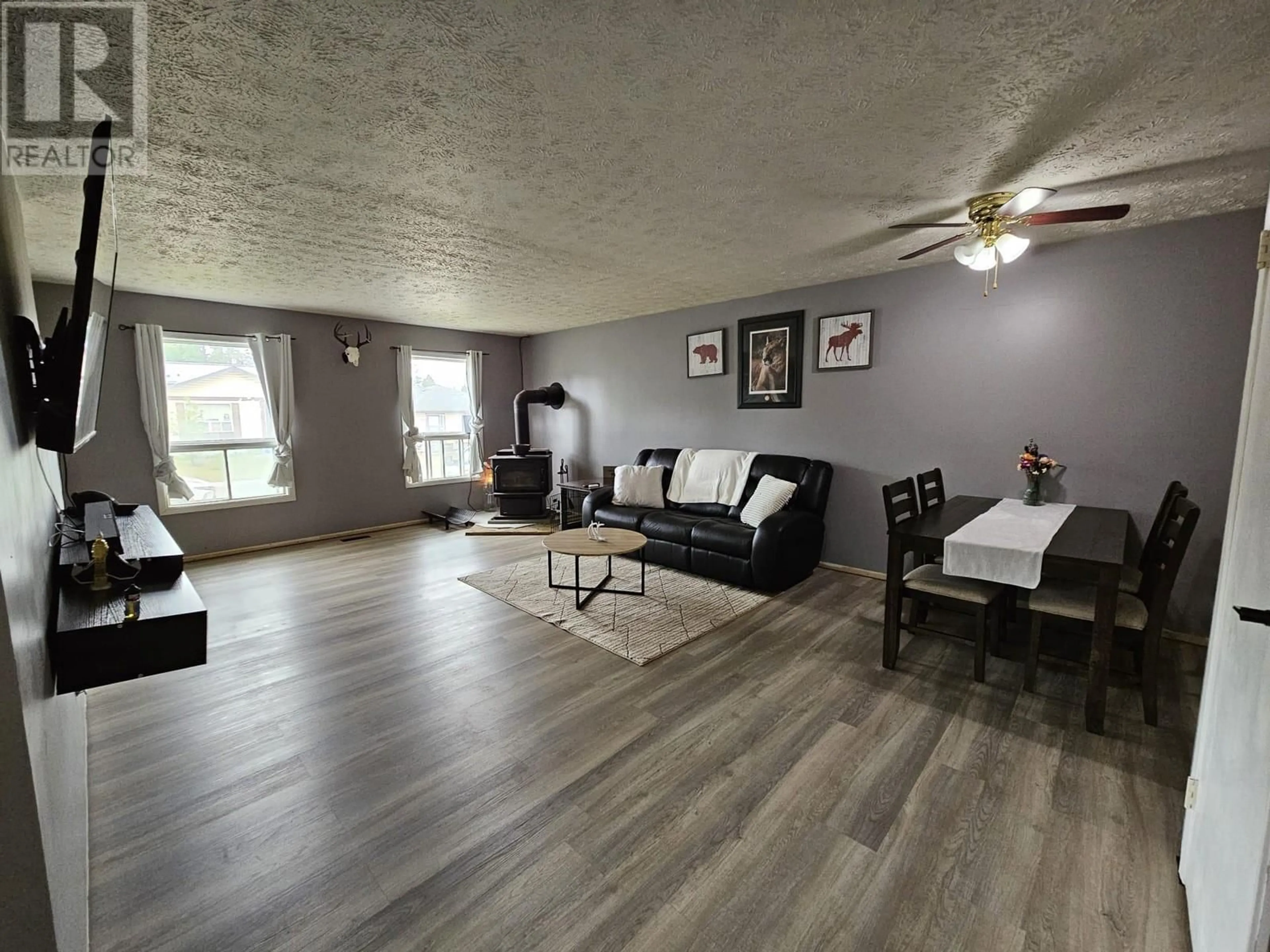 Living room with furniture, wood/laminate floor for 135 SPIEKER Avenue, Tumbler Ridge British Columbia V0C2W0