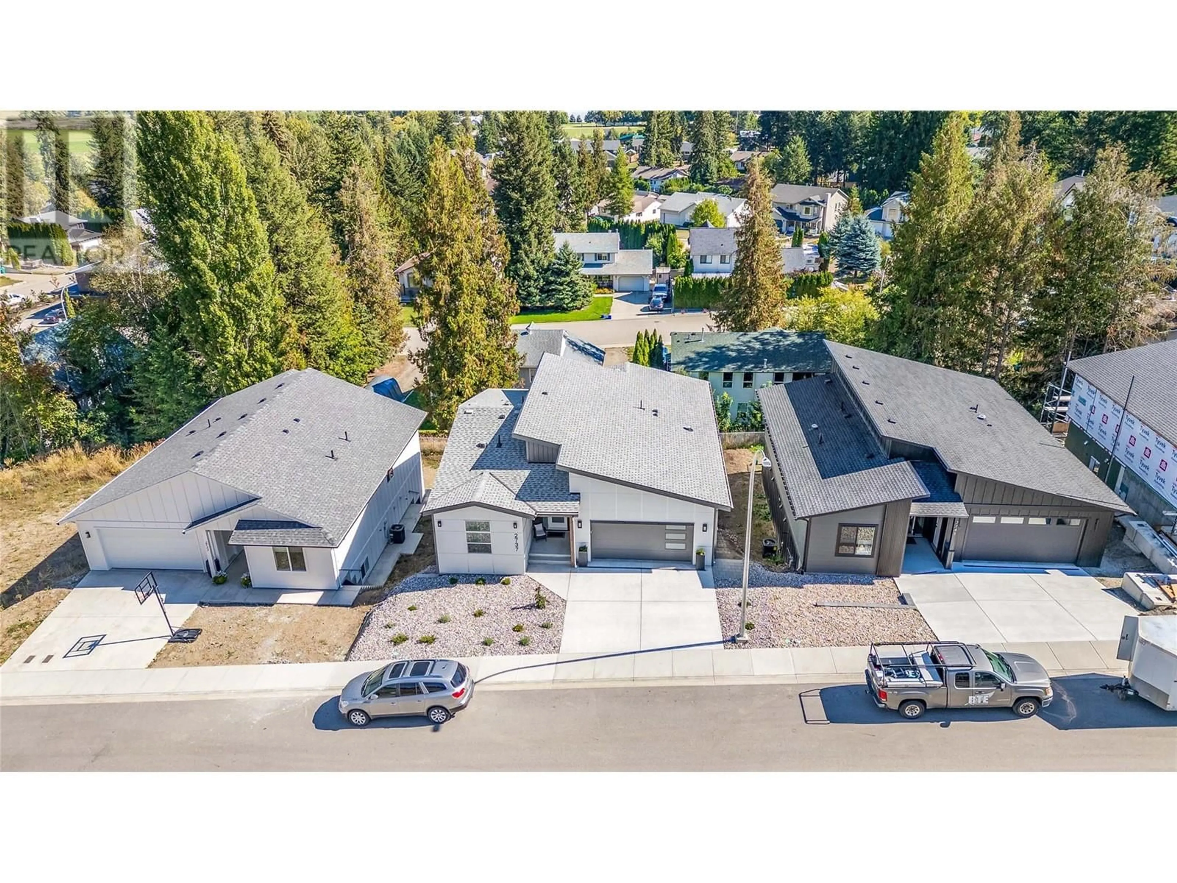 A pic from outside/outdoor area/front of a property/back of a property/a pic from drone, street for 2737 Cedar Ridge Street, Lumby British Columbia V0E2G5