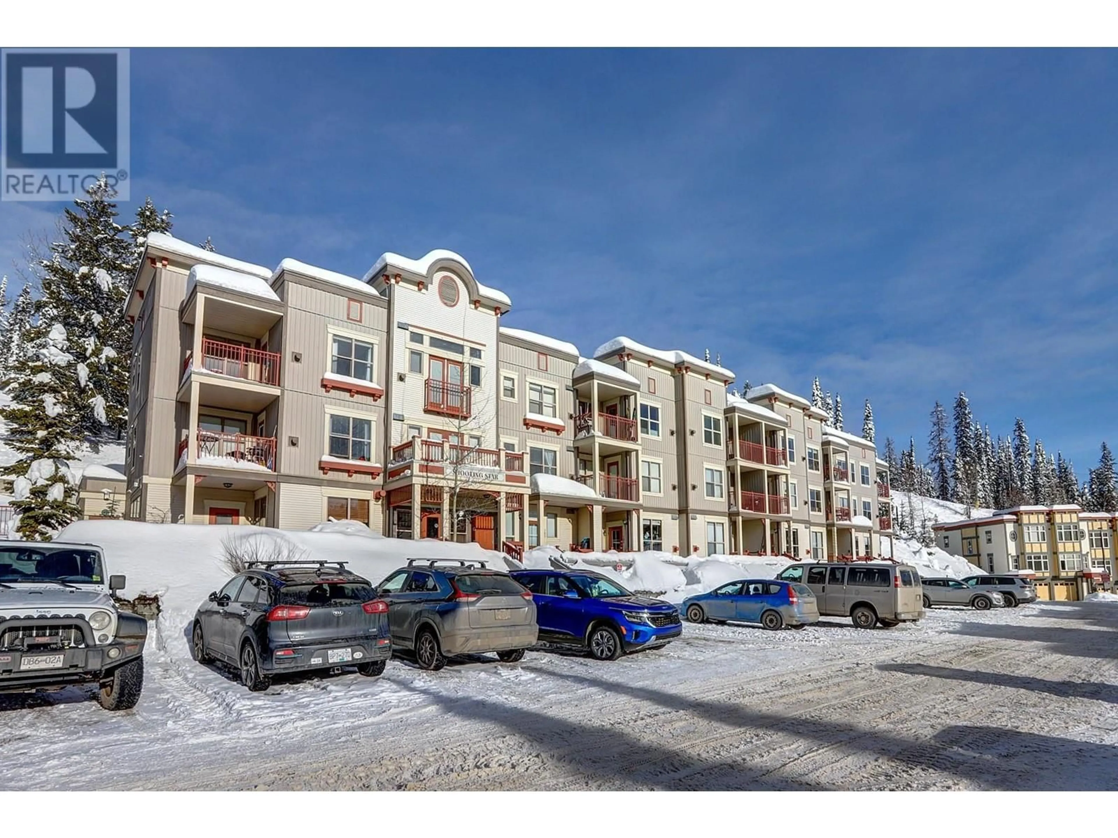 A pic from outside/outdoor area/front of a property/back of a property/a pic from drone, mountain view for 306 - 9802 SILVER STAR ROAD, Silver Star British Columbia V1B3M1