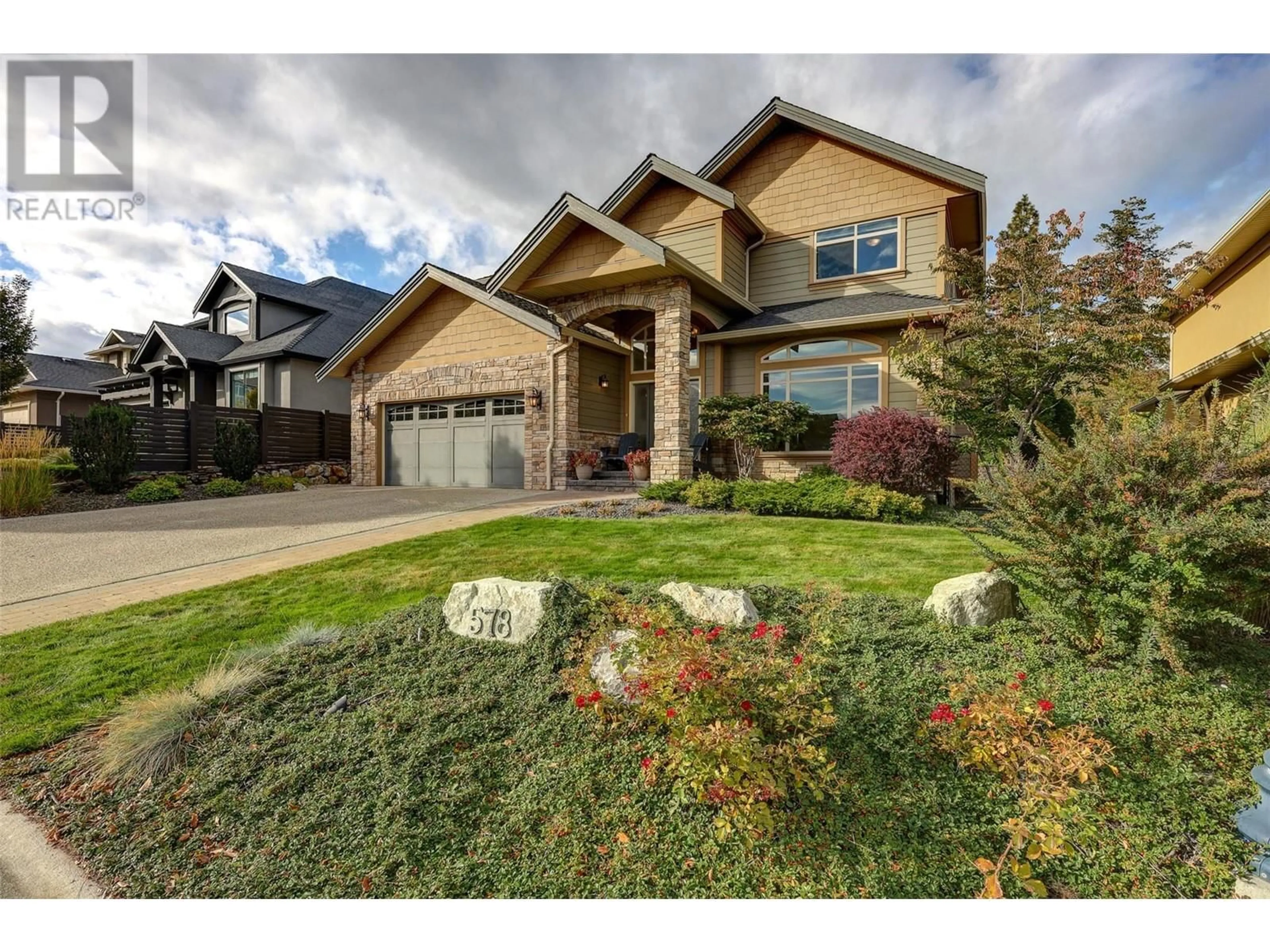 Home with brick exterior material, street for 578 Arbor View Drive, Kelowna British Columbia V1W4Z8