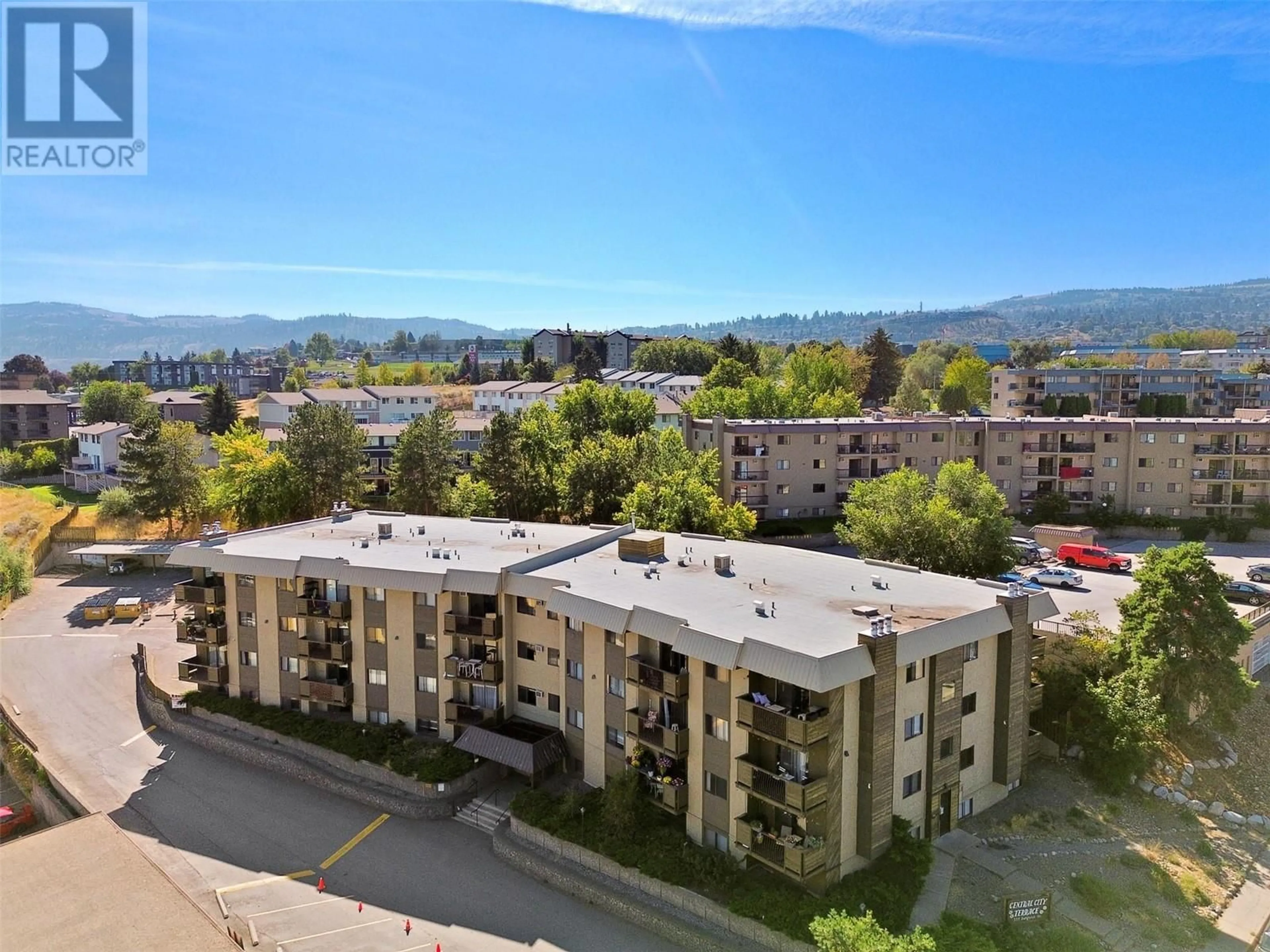 A pic from outside/outdoor area/front of a property/back of a property/a pic from drone, mountain view for 555 DALGLEISH Drive Unit# 202, Kamloops British Columbia V2C6C7