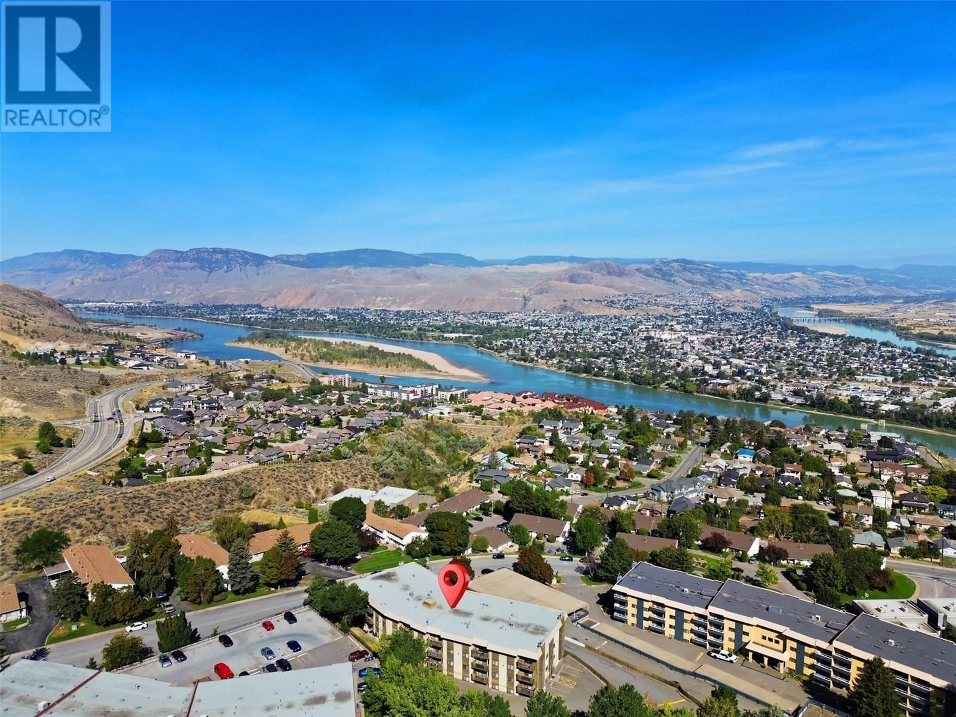 A pic from outside/outdoor area/front of a property/back of a property/a pic from drone, mountain view for 555 DALGLEISH Drive Unit# 202, Kamloops British Columbia V2C6C7