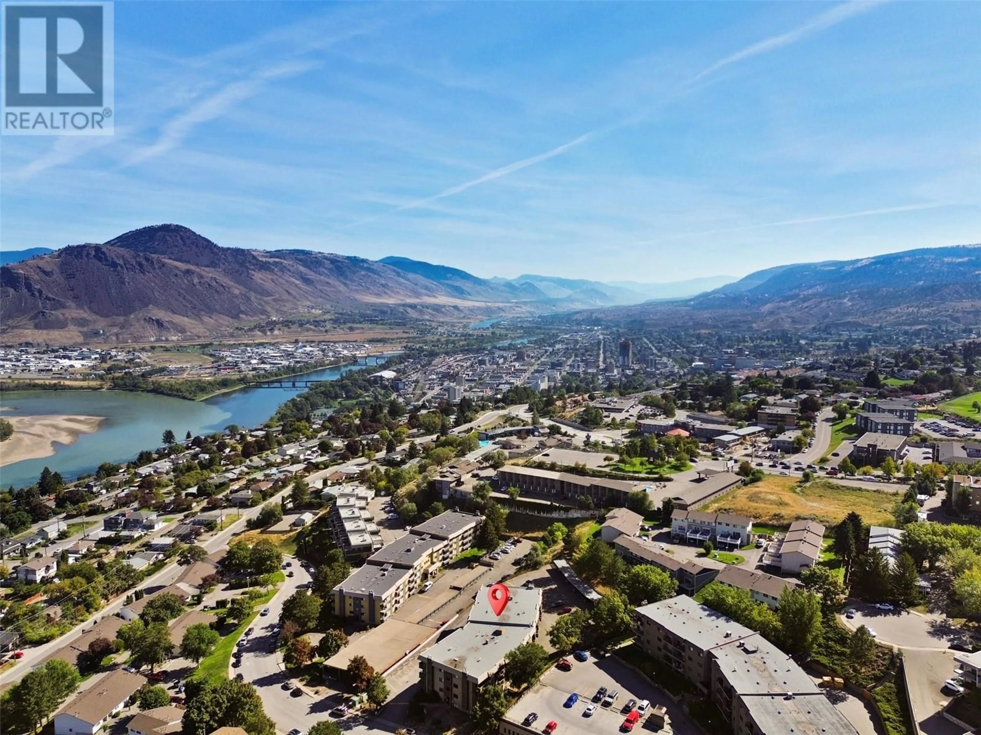 A pic from outside/outdoor area/front of a property/back of a property/a pic from drone, mountain view for 555 DALGLEISH Drive Unit# 202, Kamloops British Columbia V2C6C7