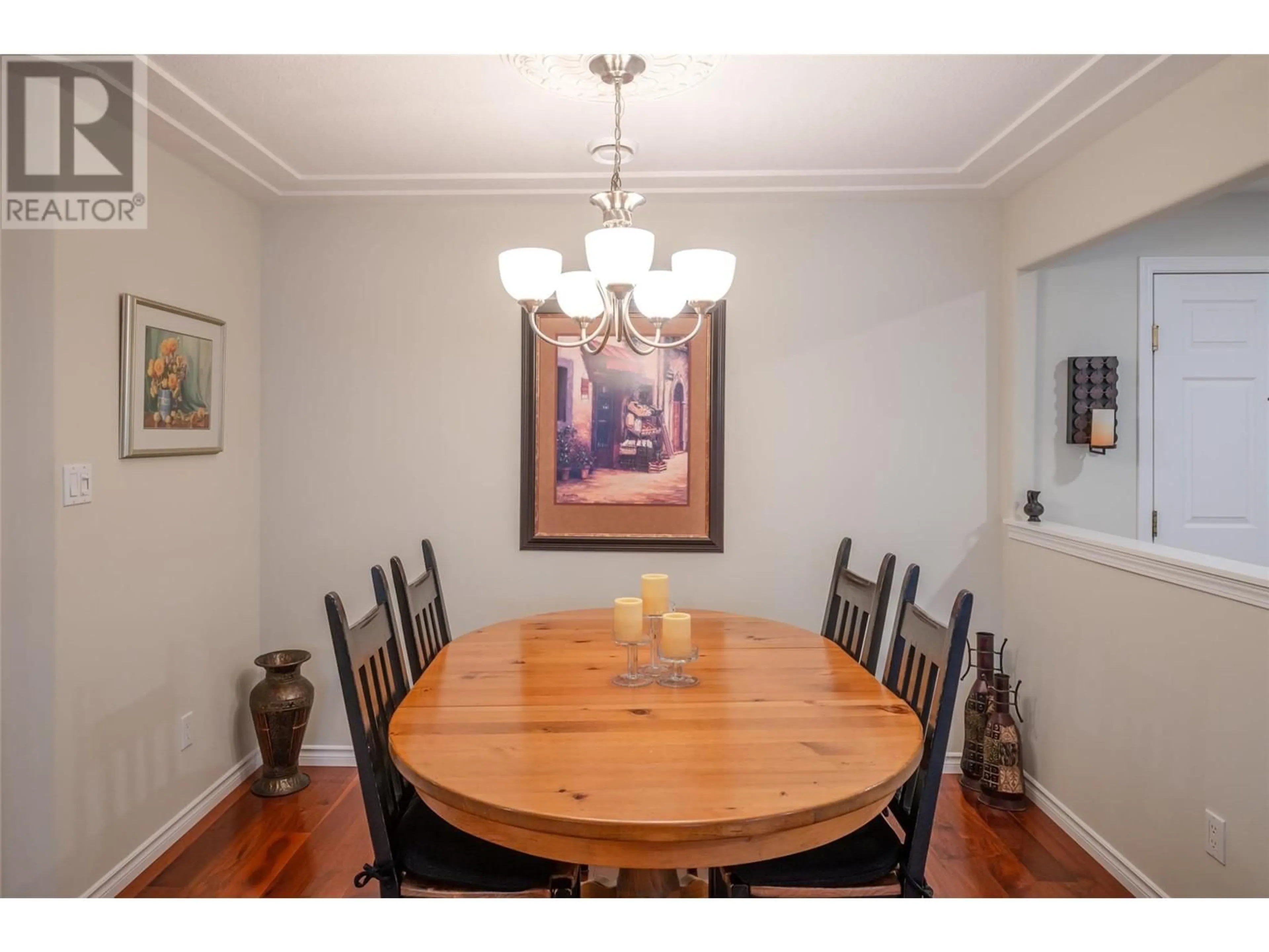 Dining room, wood/laminate floor for 2285 Atkinson Street Unit# 702, Penticton British Columbia V2A8R7