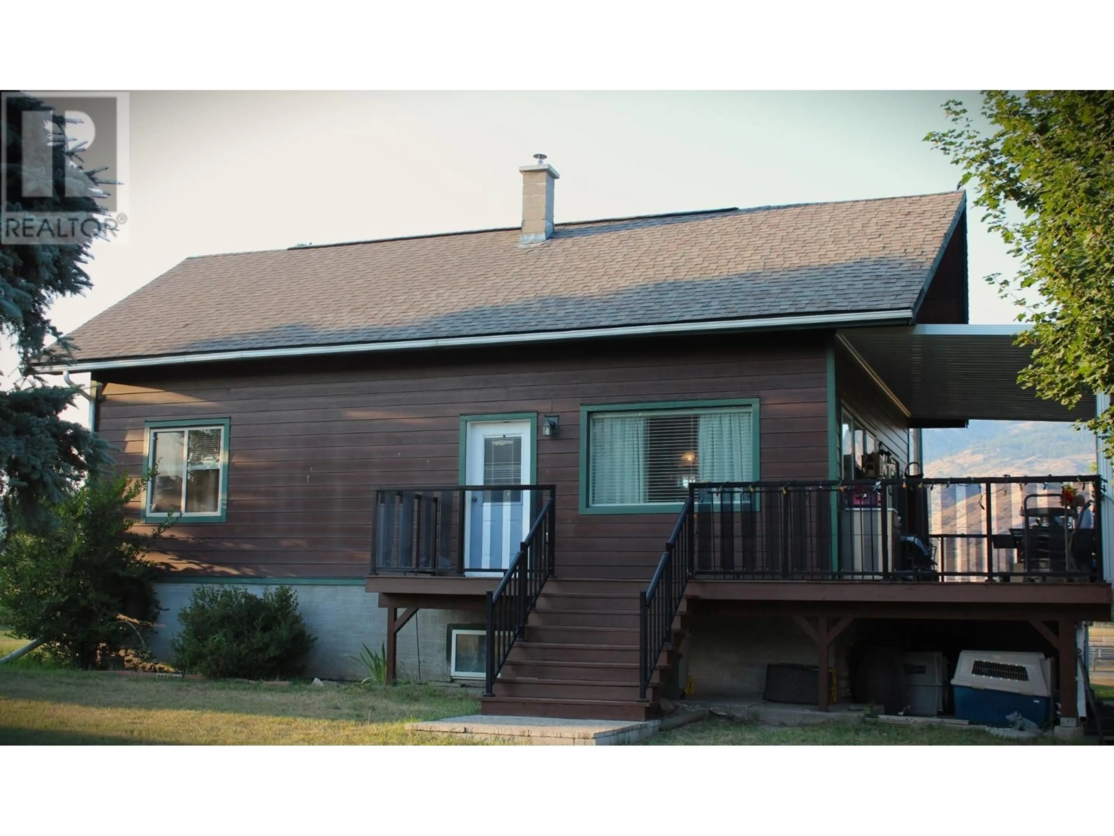 Home with vinyl exterior material, street for 5695 INTERNATIONAL ROAD, Grand Forks British Columbia V0H1H4