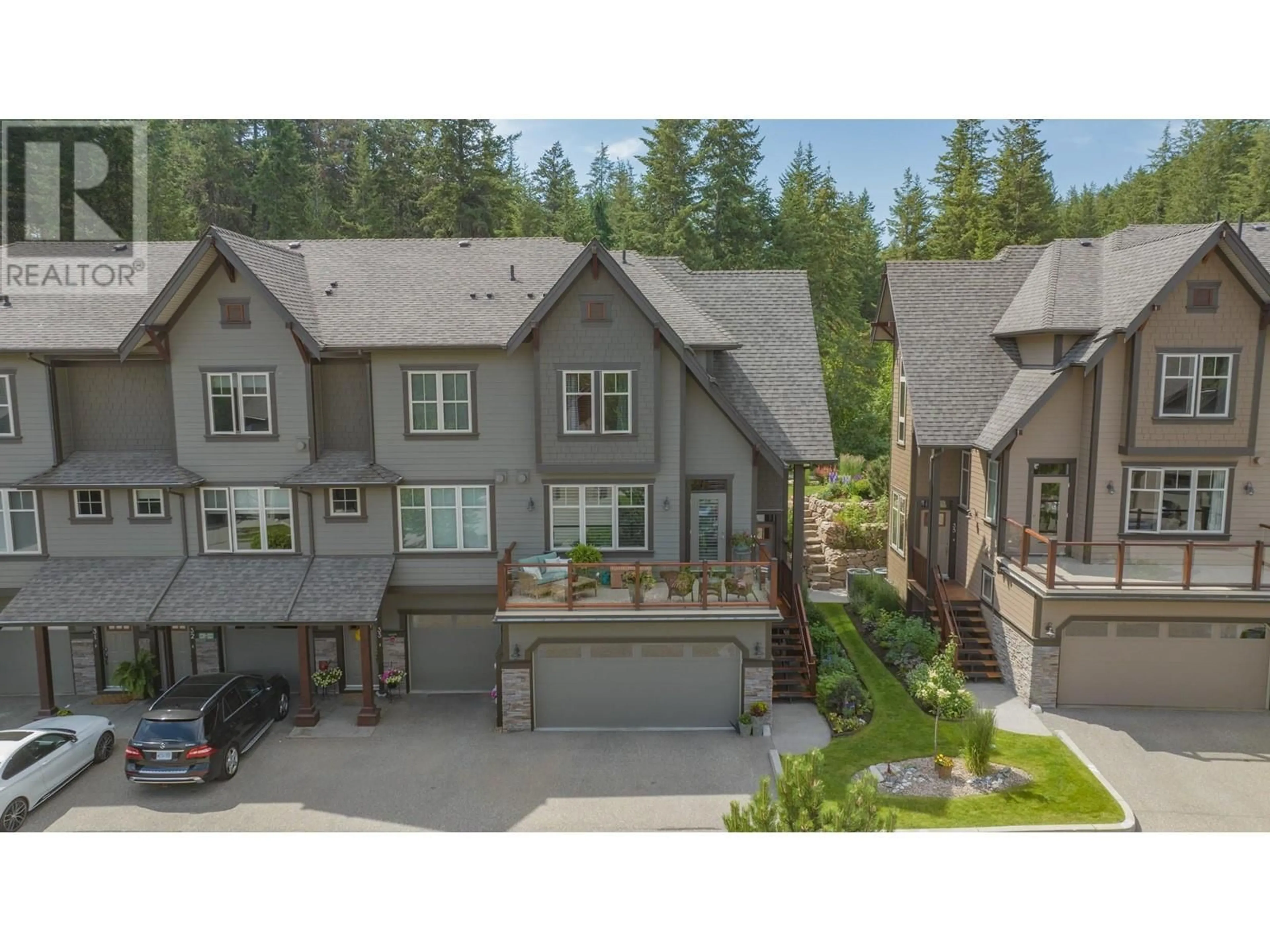 A pic from outside/outdoor area/front of a property/back of a property/a pic from drone, unknown for 333 Longspoon Drive Unit# 34, Vernon British Columbia V1H2L1