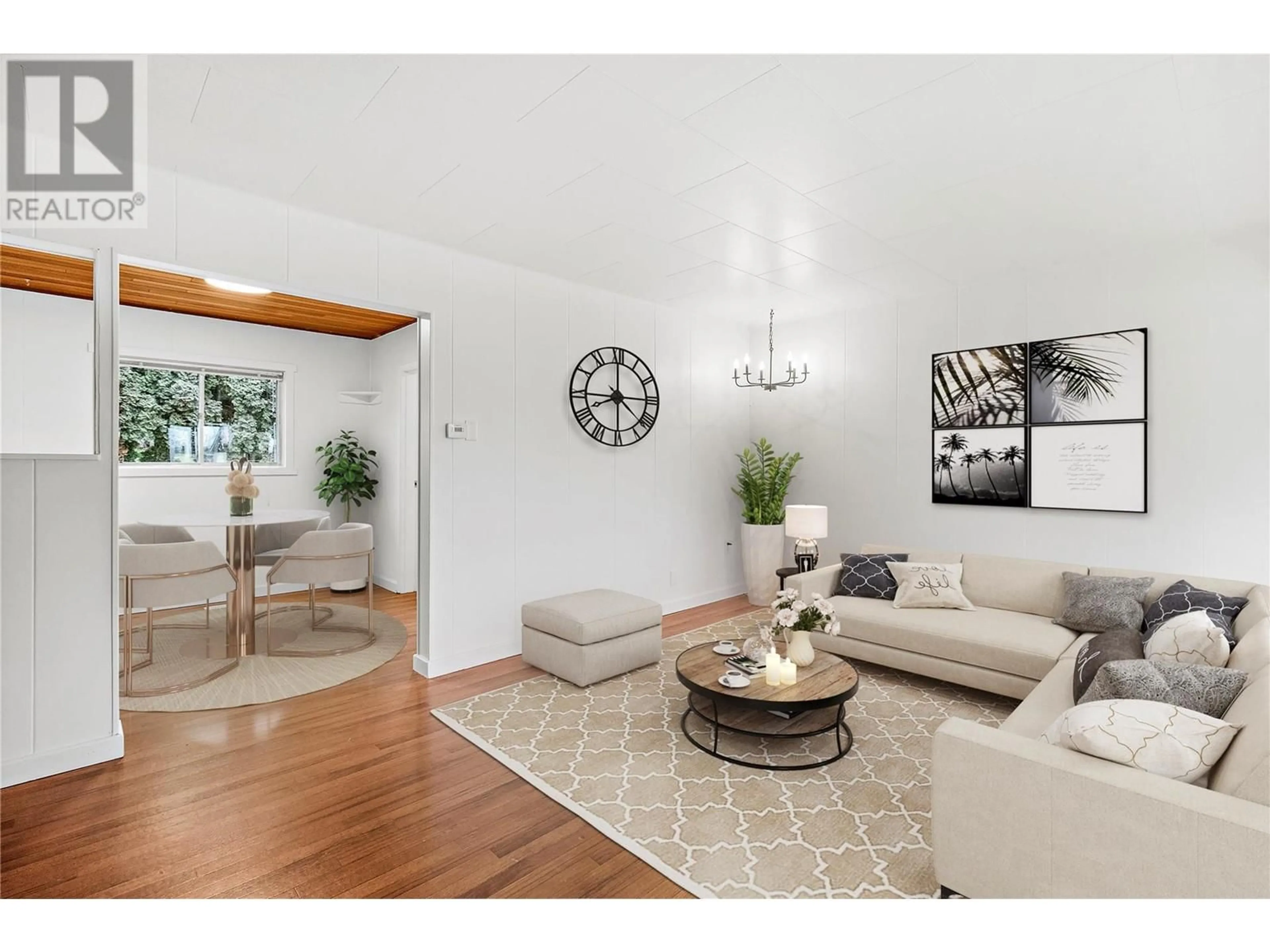 Living room with furniture, wood/laminate floor for 570 1 Avenue SE, Salmon Arm British Columbia V1E1G7