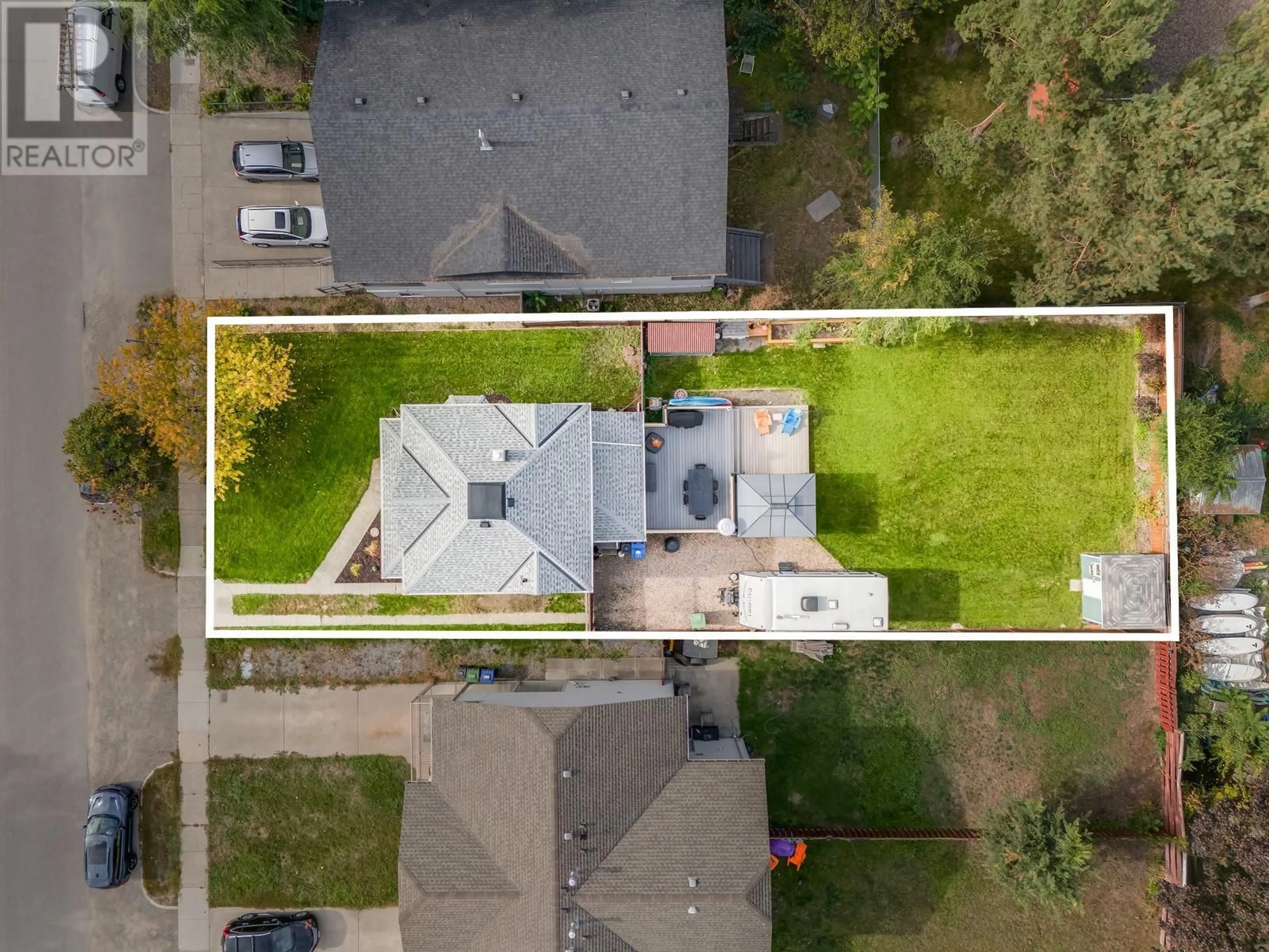 A pic from outside/outdoor area/front of a property/back of a property/a pic from drone, street for 732 DeHart Avenue, Kelowna British Columbia V1Y6A1