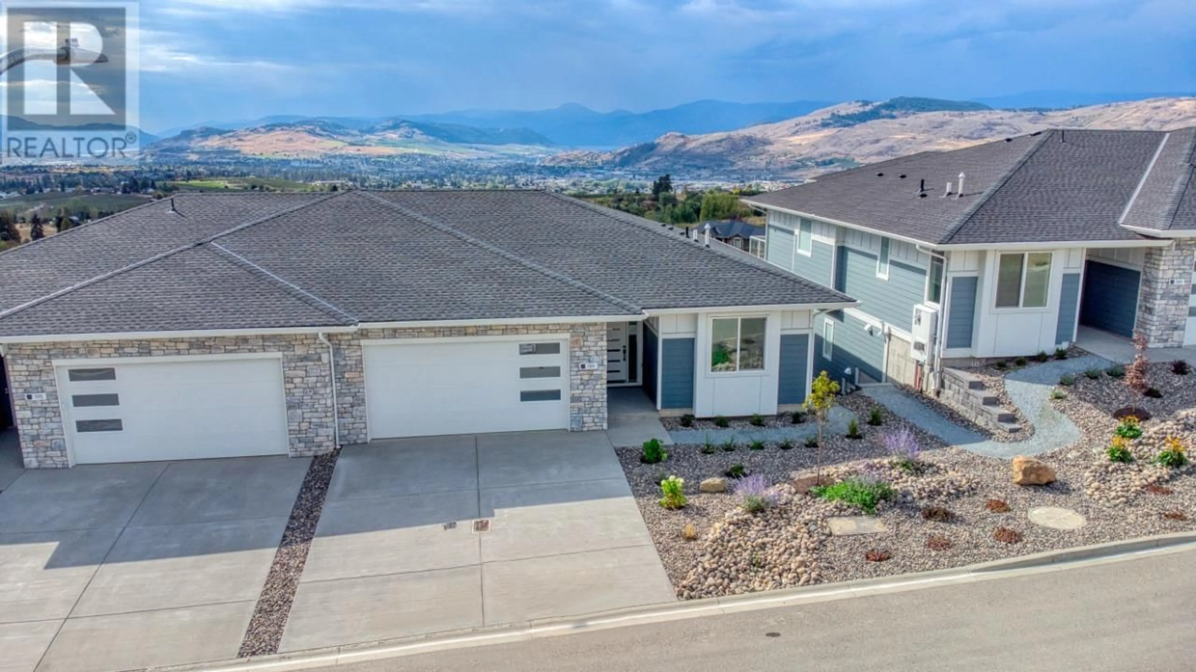 A pic from outside/outdoor area/front of a property/back of a property/a pic from drone, mountain view for 189 Wildsong Crescent, Vernon British Columbia V1H2J4