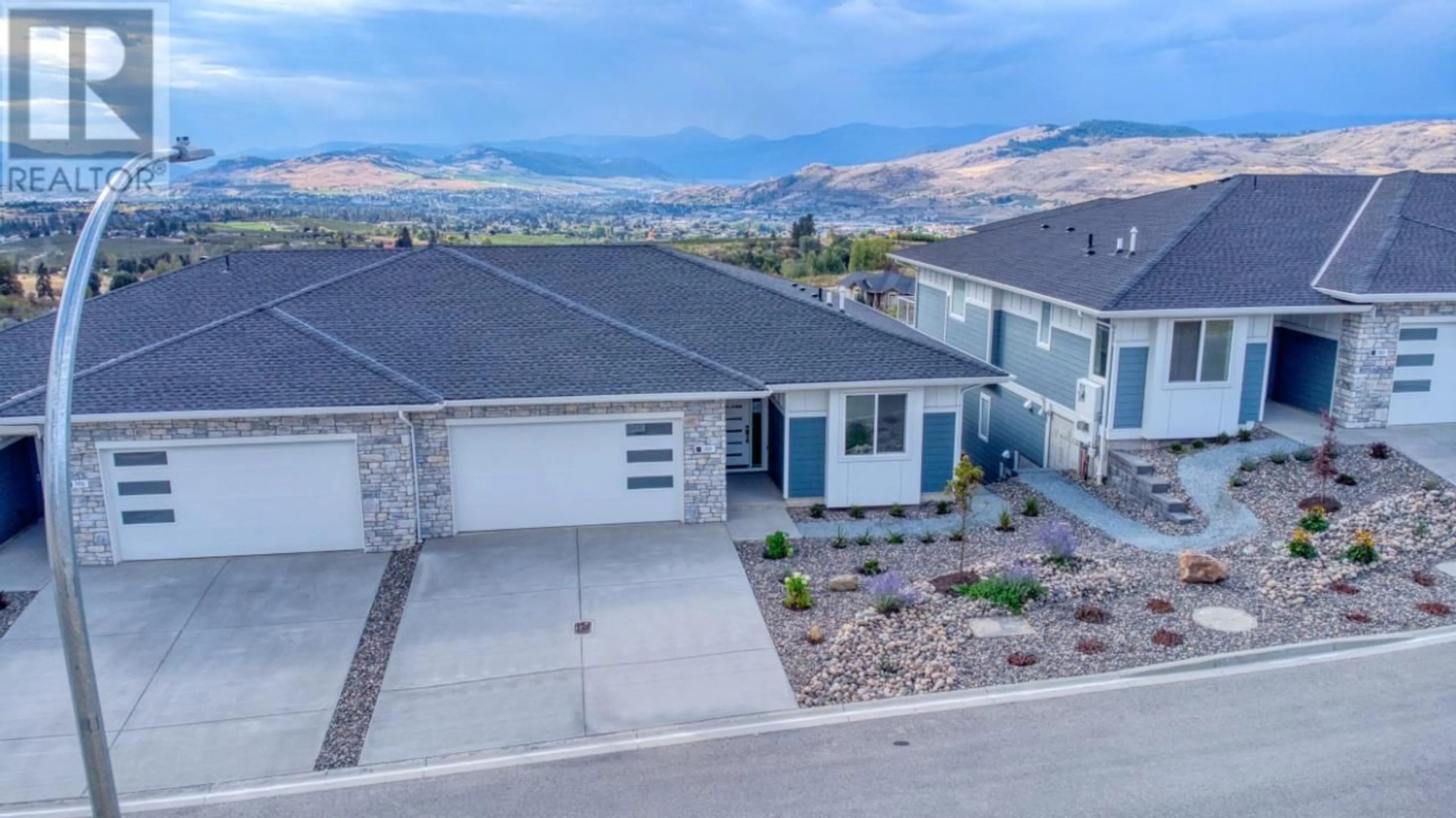 A pic from outside/outdoor area/front of a property/back of a property/a pic from drone, mountain view for 189 Wildsong Crescent, Vernon British Columbia V1H2J4