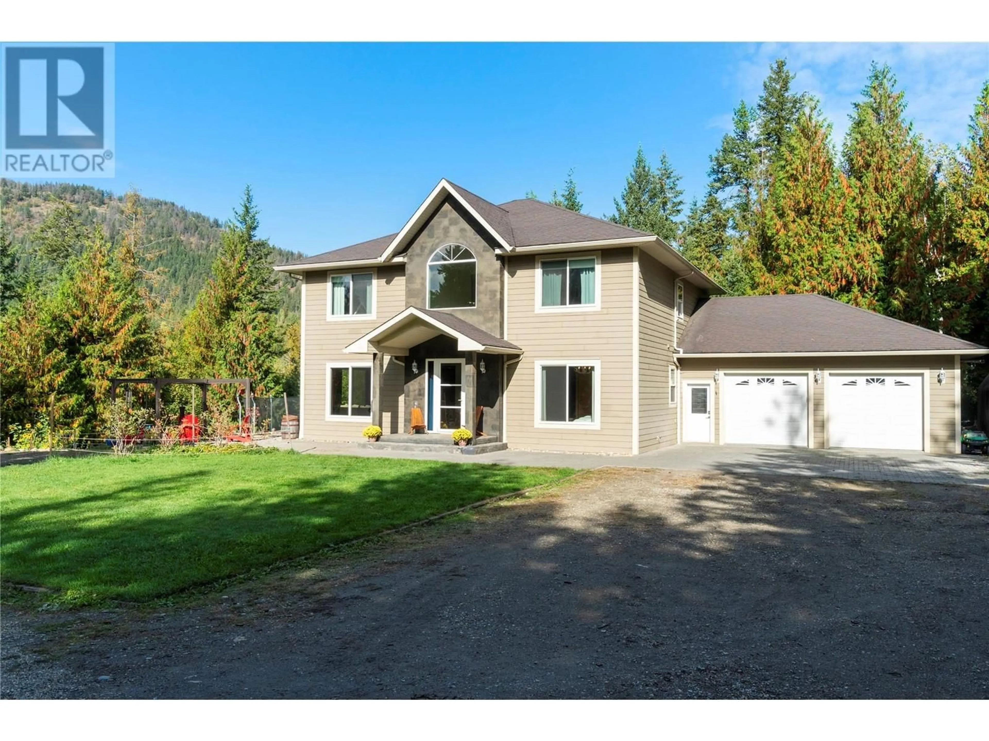 A pic from outside/outdoor area/front of a property/back of a property/a pic from drone, mountain view for 1534 Recline Ridge Road, Tappen British Columbia V0E2X3