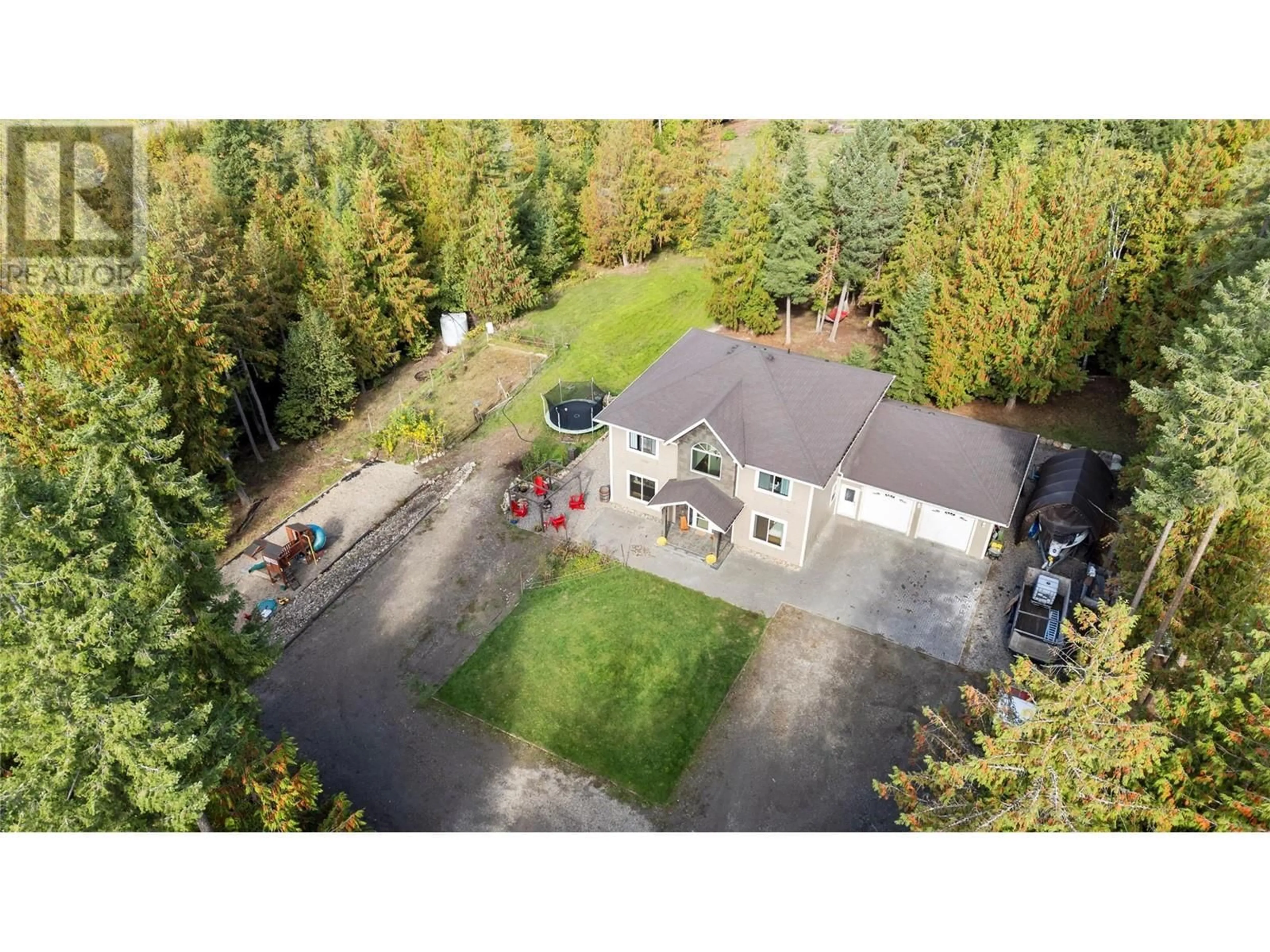 A pic from outside/outdoor area/front of a property/back of a property/a pic from drone, unknown for 1534 Recline Ridge Road, Tappen British Columbia V0E2X3