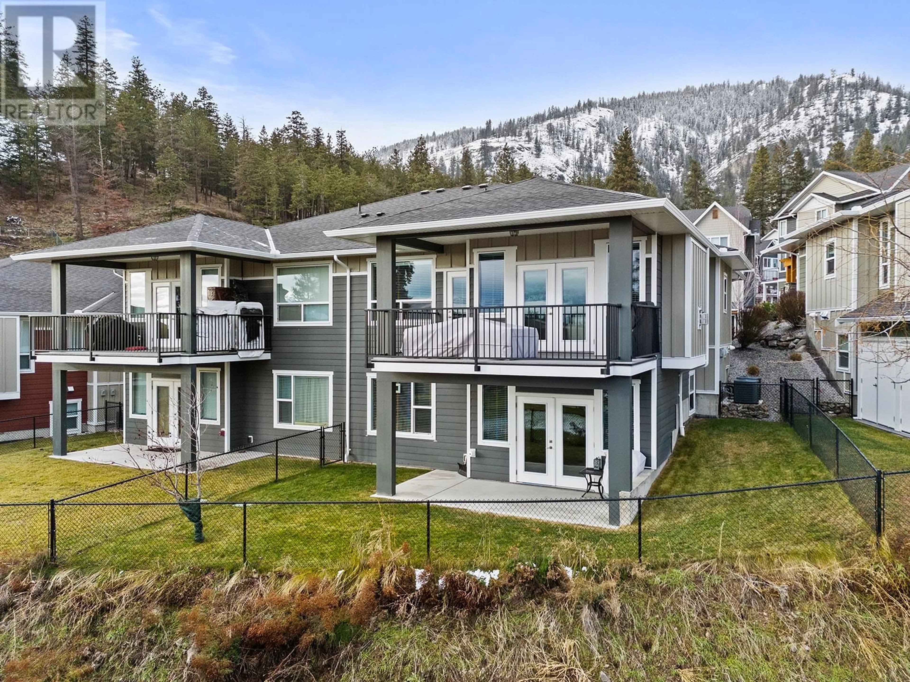 A pic from outside/outdoor area/front of a property/back of a property/a pic from drone, mountain view for 2490 Tuscany Drive Unit# 4, West Kelowna British Columbia V4T3M4