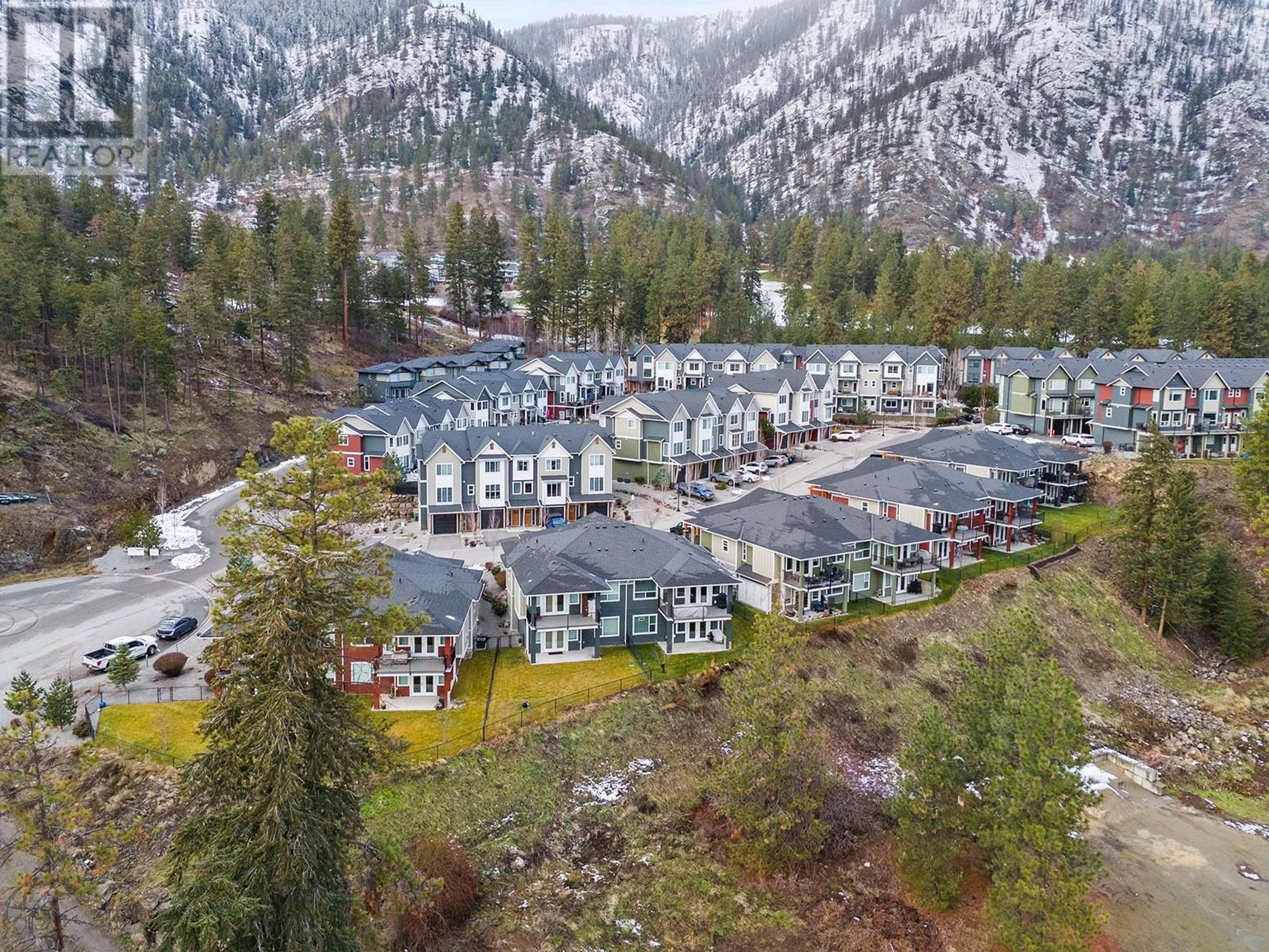 A pic from outside/outdoor area/front of a property/back of a property/a pic from drone, mountain view for 2490 Tuscany Drive Unit# 4, West Kelowna British Columbia V4T3M4