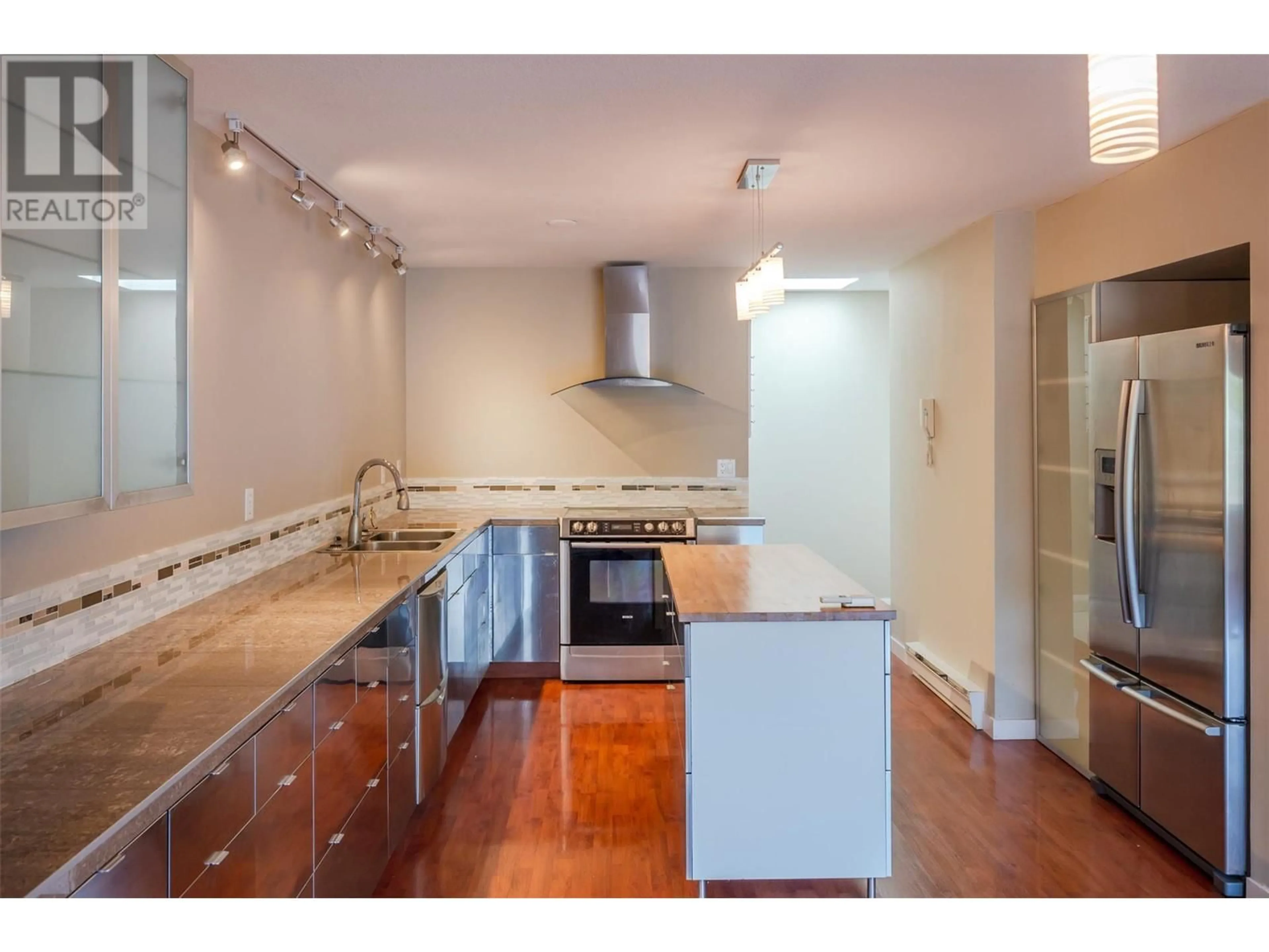 Open concept kitchen, unknown for 303 - 208 ELLIS STREET, Penticton British Columbia V2A4L6