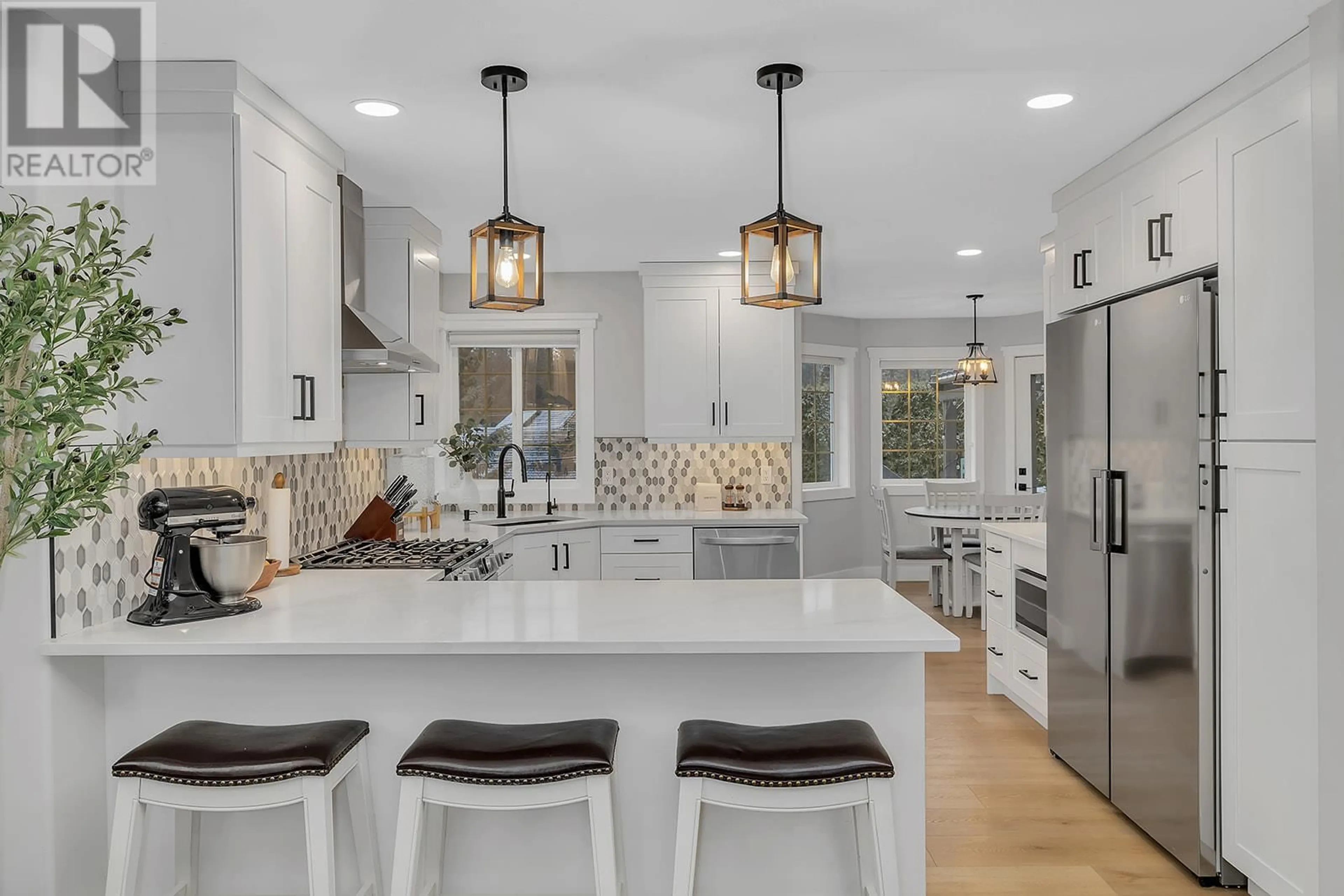 Contemporary kitchen, ceramic/tile floor for 4031 Robinia Court, Kelowna British Columbia V1W3Y2