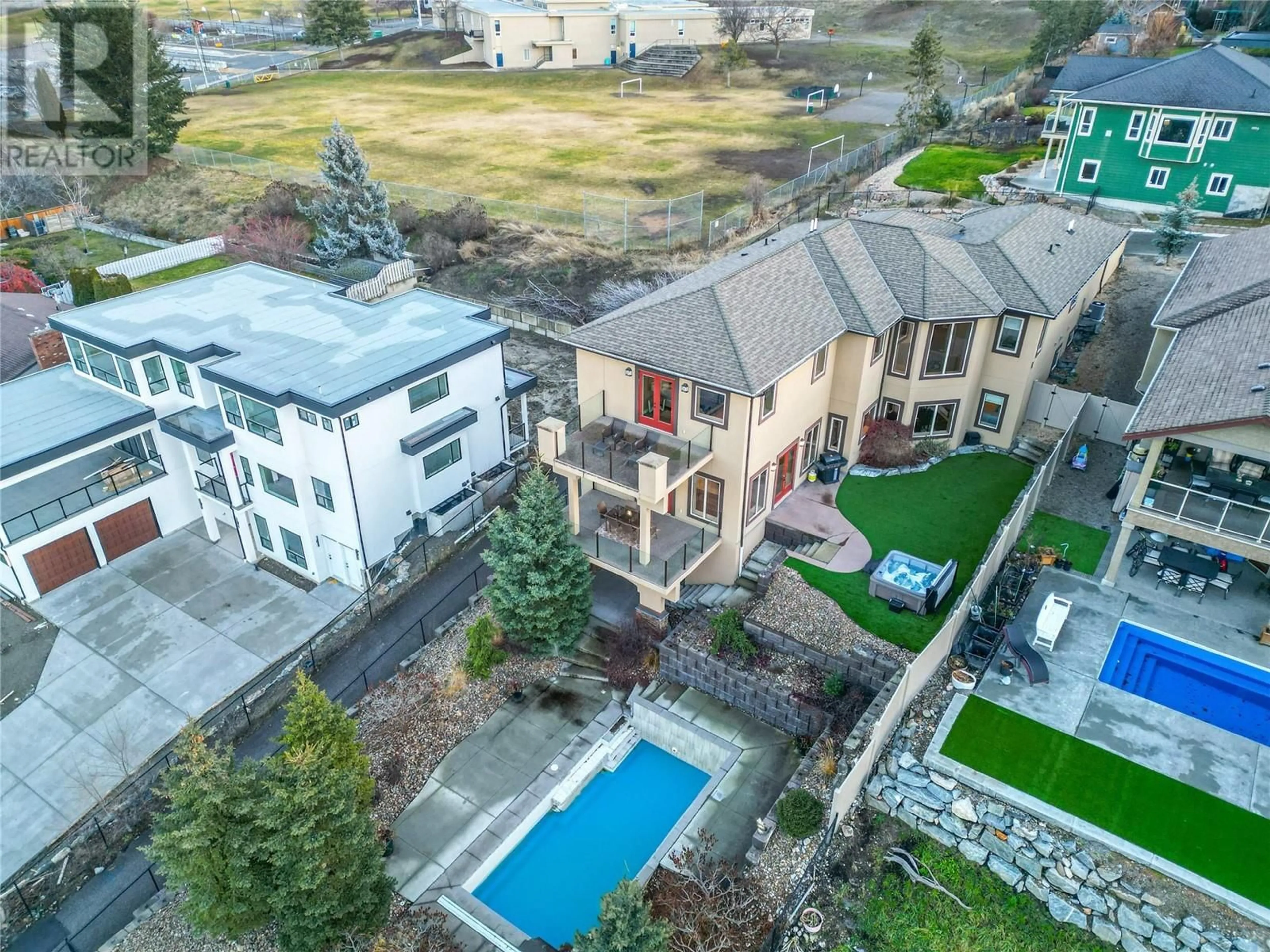 A pic from outside/outdoor area/front of a property/back of a property/a pic from drone, mountain view for 1029 Longacre Place, Vernon British Columbia V1H1H7