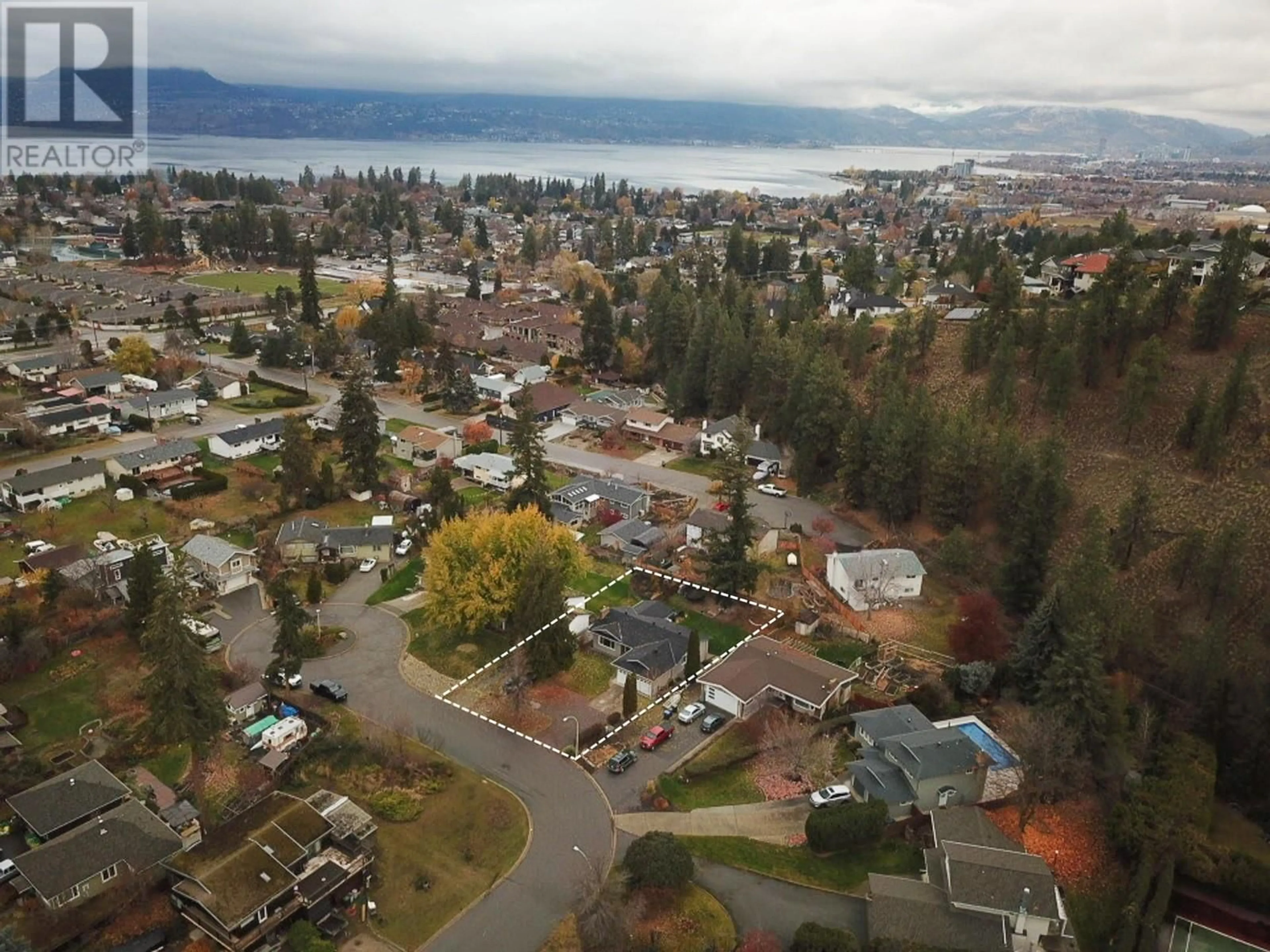 A pic from outside/outdoor area/front of a property/back of a property/a pic from drone, mountain view for 766 Favell Court, Kelowna British Columbia V1W2M7