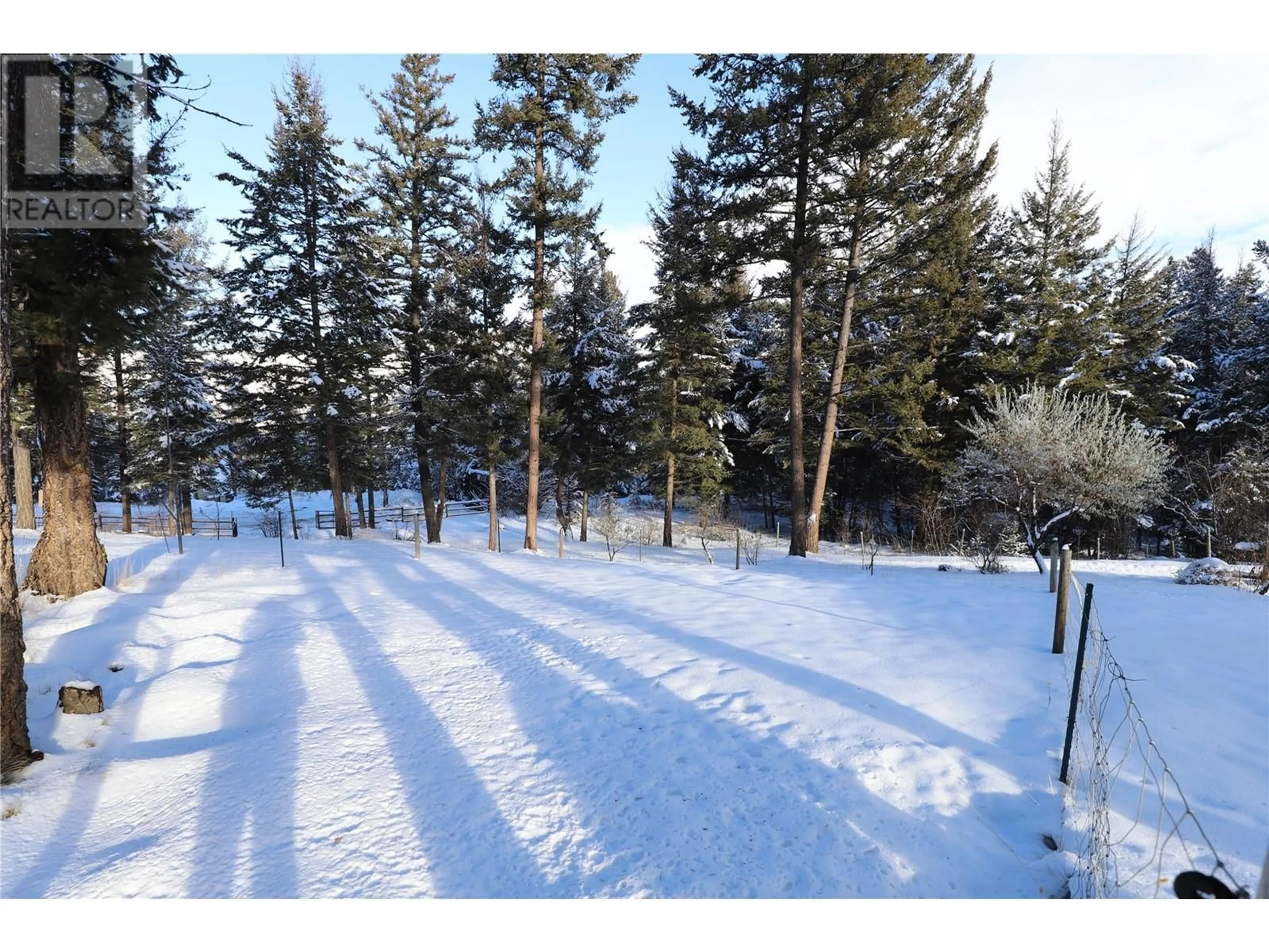 A pic from outside/outdoor area/front of a property/back of a property/a pic from drone, forest/trees view for 609 WILD ROSE Drive Lot# 21, Merritt British Columbia V1K1B8