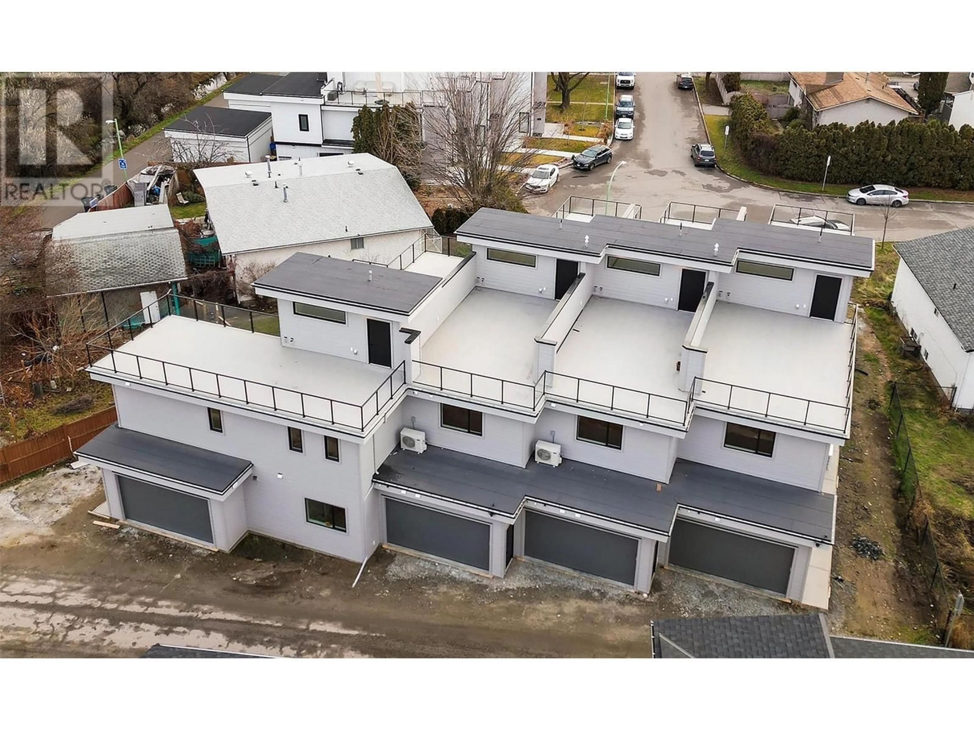 A pic from outside/outdoor area/front of a property/back of a property/a pic from drone, building for 732 Coopland Crescent Unit# 2, Kelowna British Columbia V1Y2V1