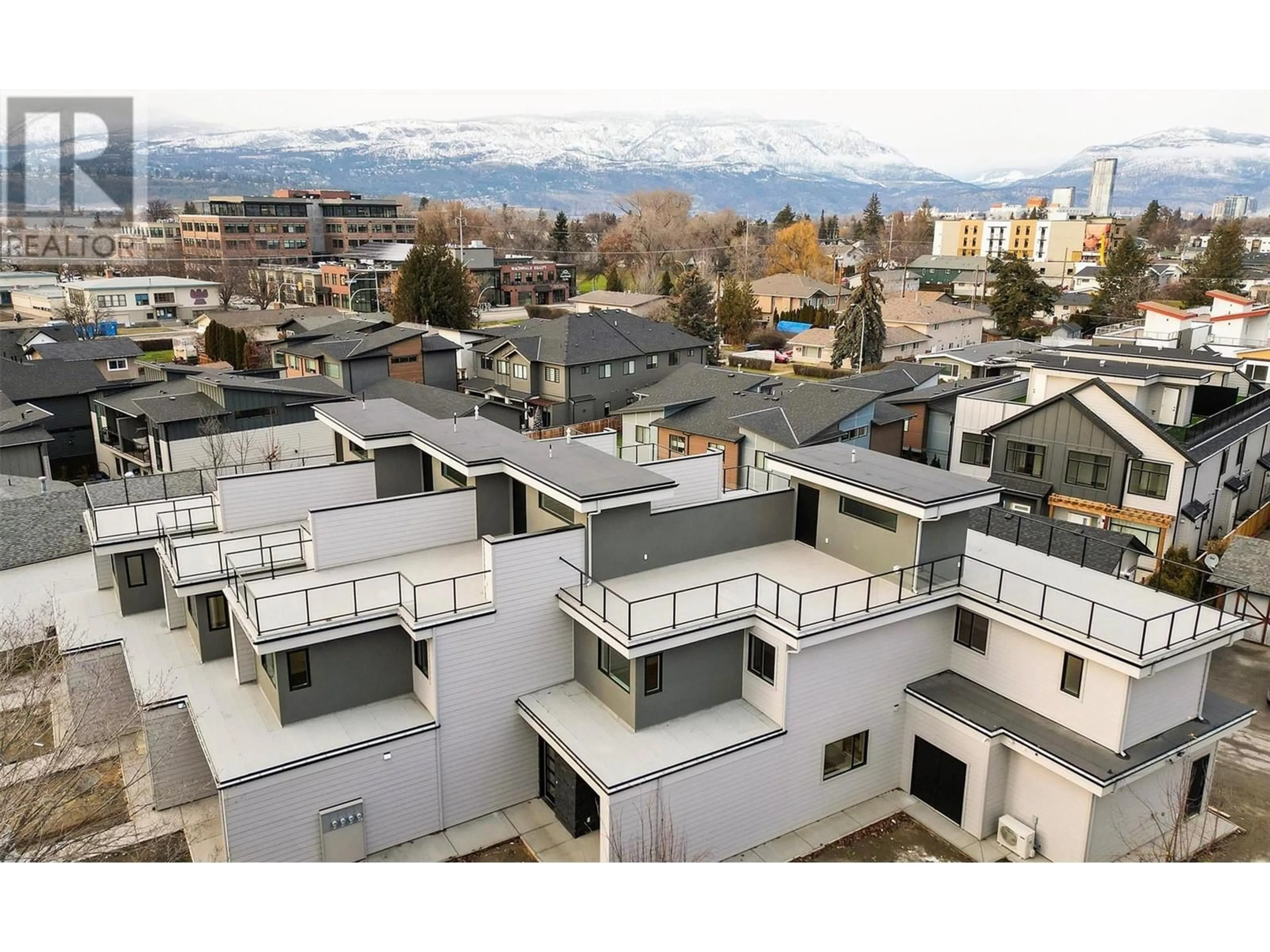 A pic from outside/outdoor area/front of a property/back of a property/a pic from drone, city buildings view from balcony for 732 Coopland Crescent Unit# 2, Kelowna British Columbia V1Y2V1