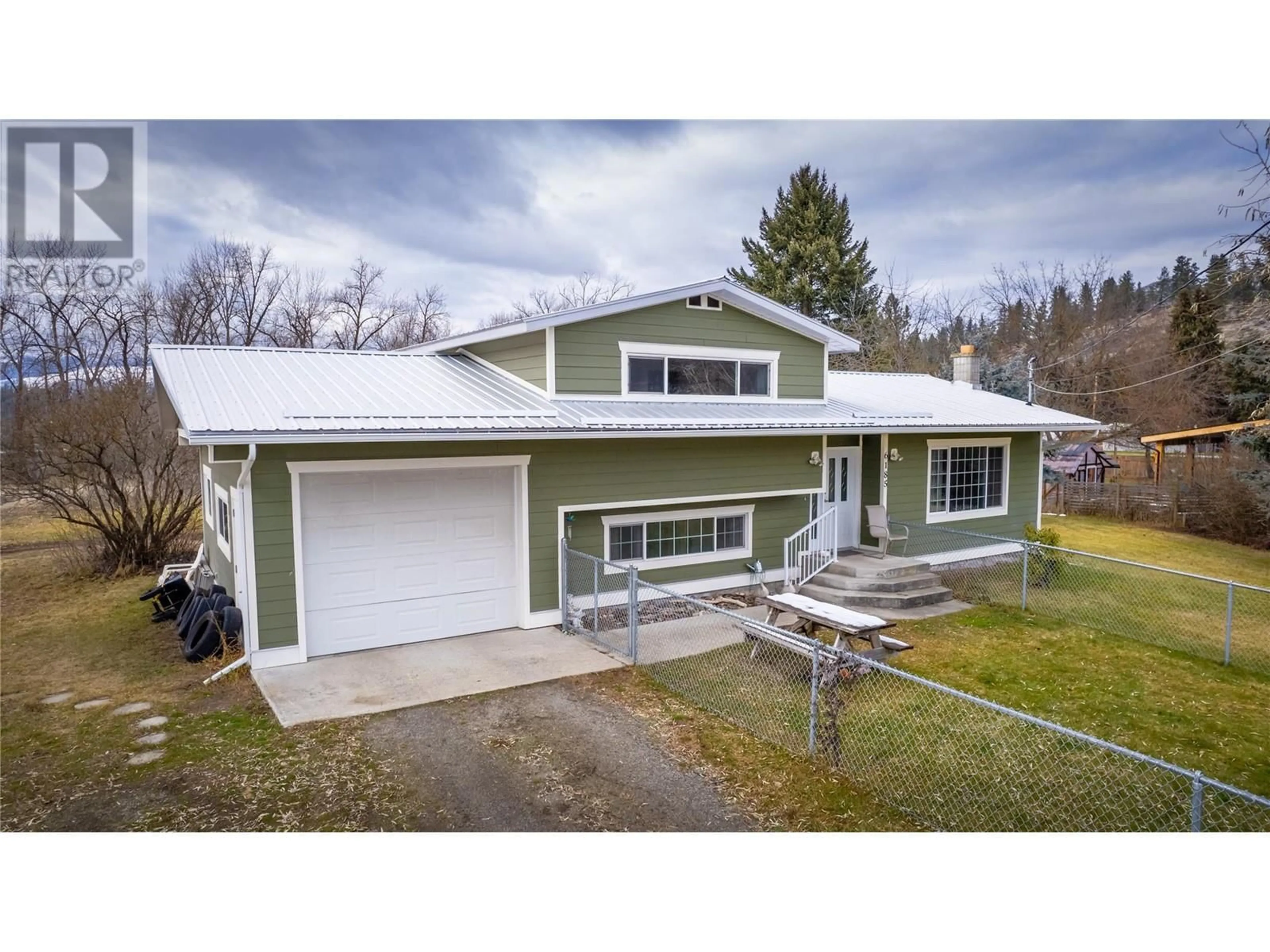 A pic from outside/outdoor area/front of a property/back of a property/a pic from drone, street for 6185 NURSERY Road, Grand Forks British Columbia V0H1H9