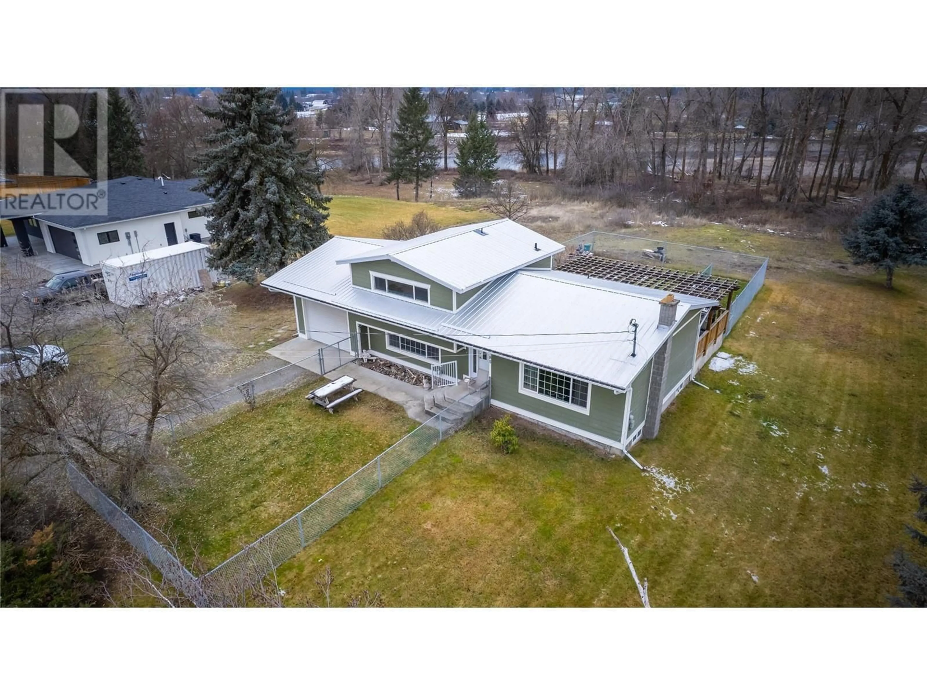 A pic from outside/outdoor area/front of a property/back of a property/a pic from drone, building for 6185 NURSERY Road, Grand Forks British Columbia V0H1H9