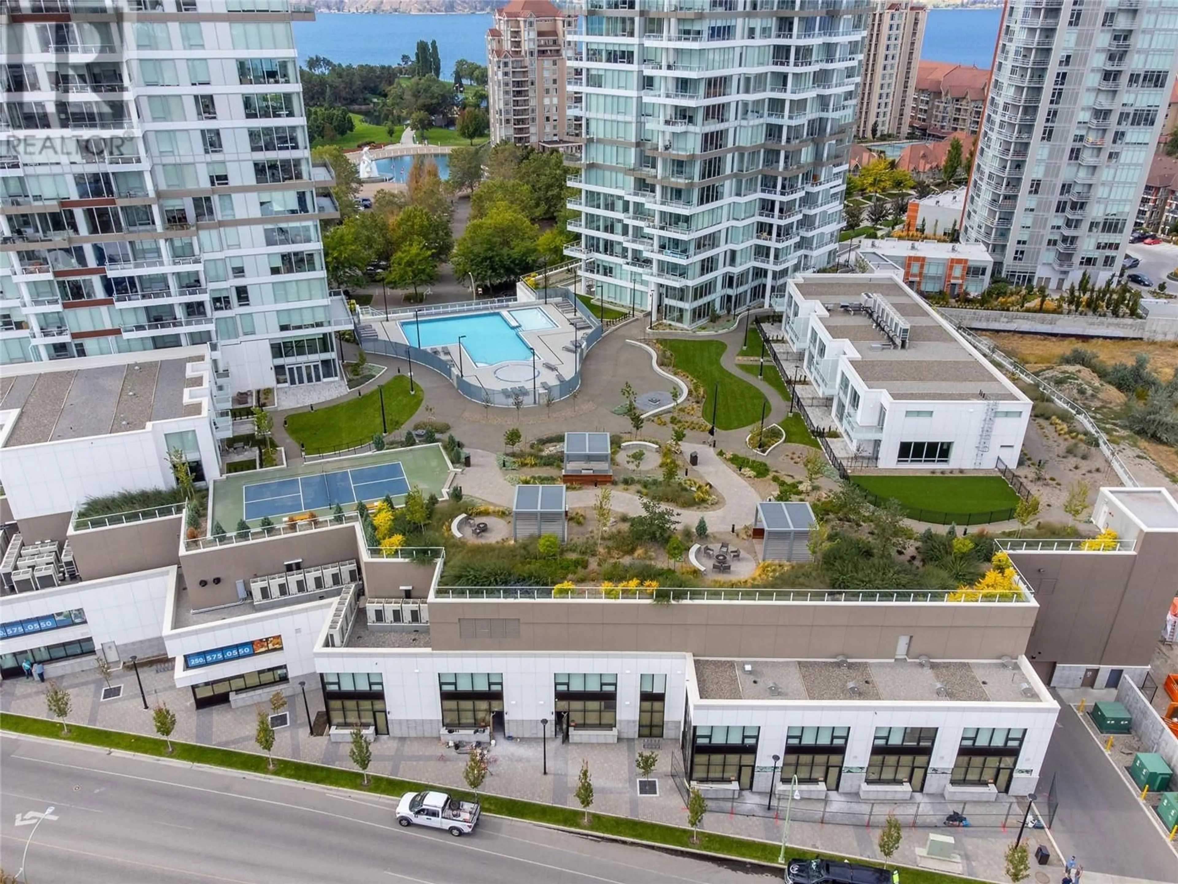 A pic from outside/outdoor area/front of a property/back of a property/a pic from drone, city buildings view from balcony for 1191 Sunset Drive Unit# 704, Kelowna British Columbia V1Y0J4