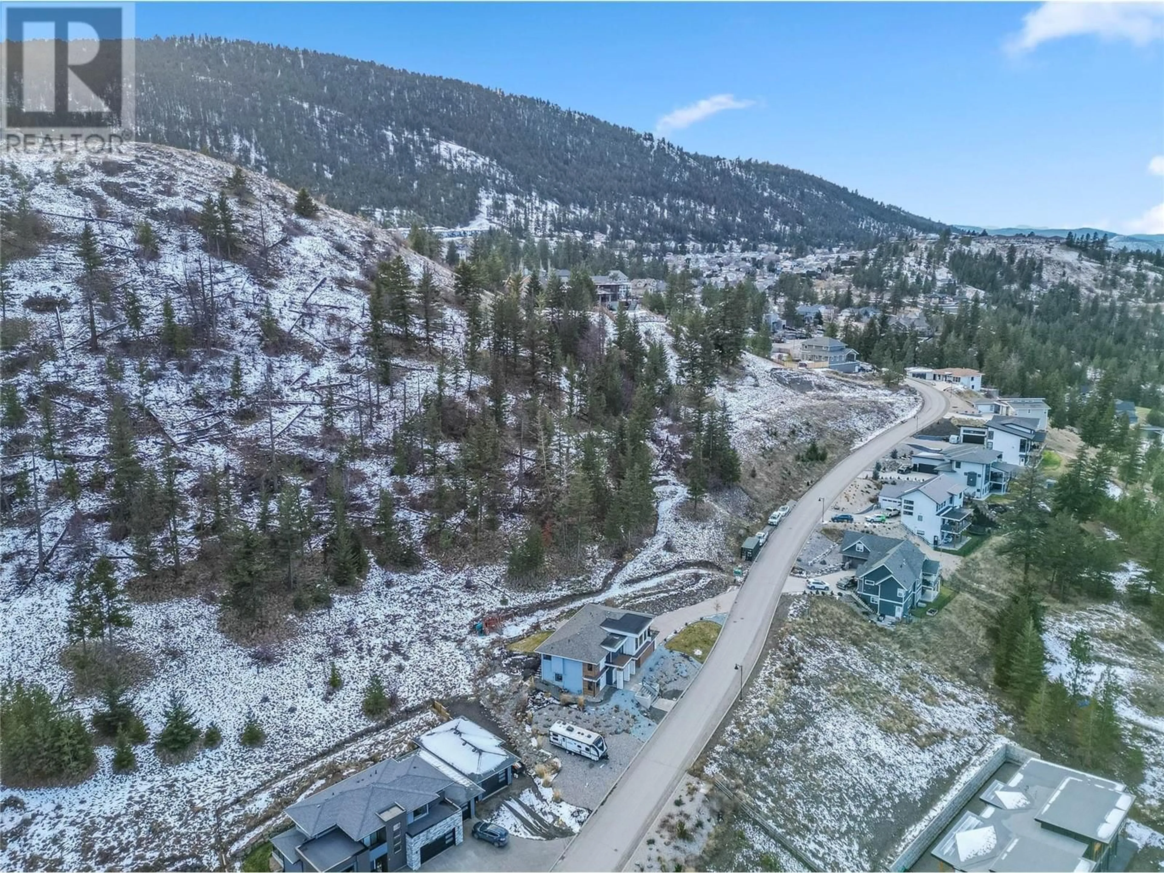 A pic from outside/outdoor area/front of a property/back of a property/a pic from drone, mountain view for 3100 Kickinghorse Drive Unit# 11, Kamloops British Columbia V2E0B8