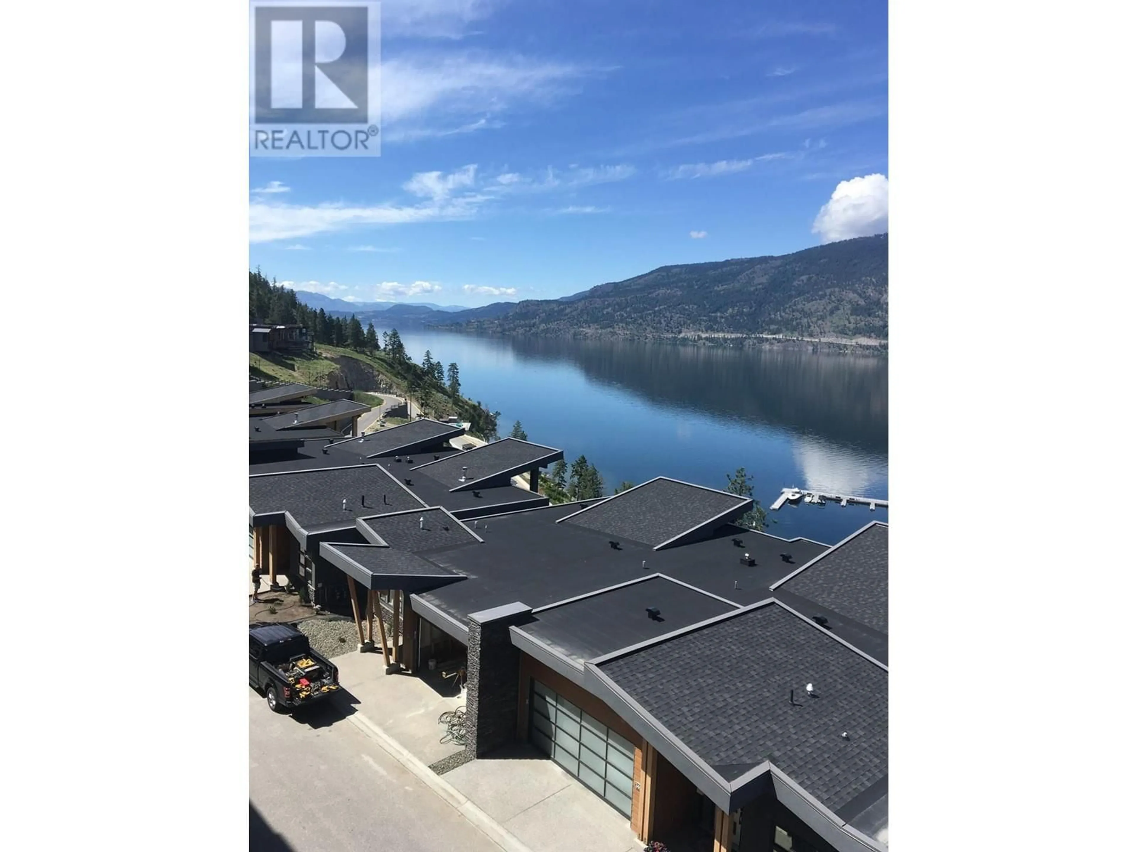 A pic from outside/outdoor area/front of a property/back of a property/a pic from drone, water/lake/river/ocean view for 3475 Granite Close Unit# 413, Kelowna British Columbia V1V0B9