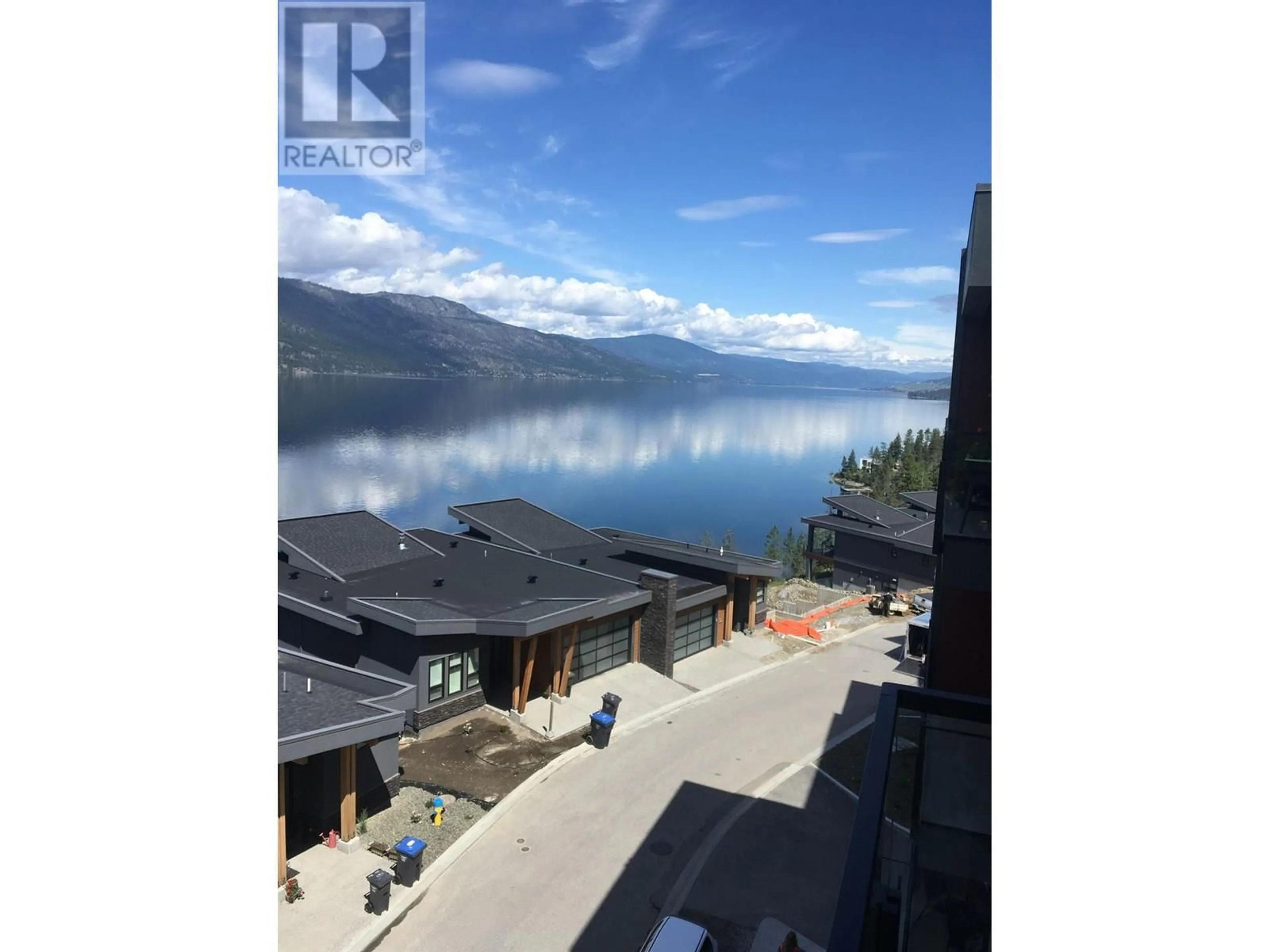 A pic from outside/outdoor area/front of a property/back of a property/a pic from drone, water/lake/river/ocean view for 3475 Granite Close Unit# 413, Kelowna British Columbia V1V0B9