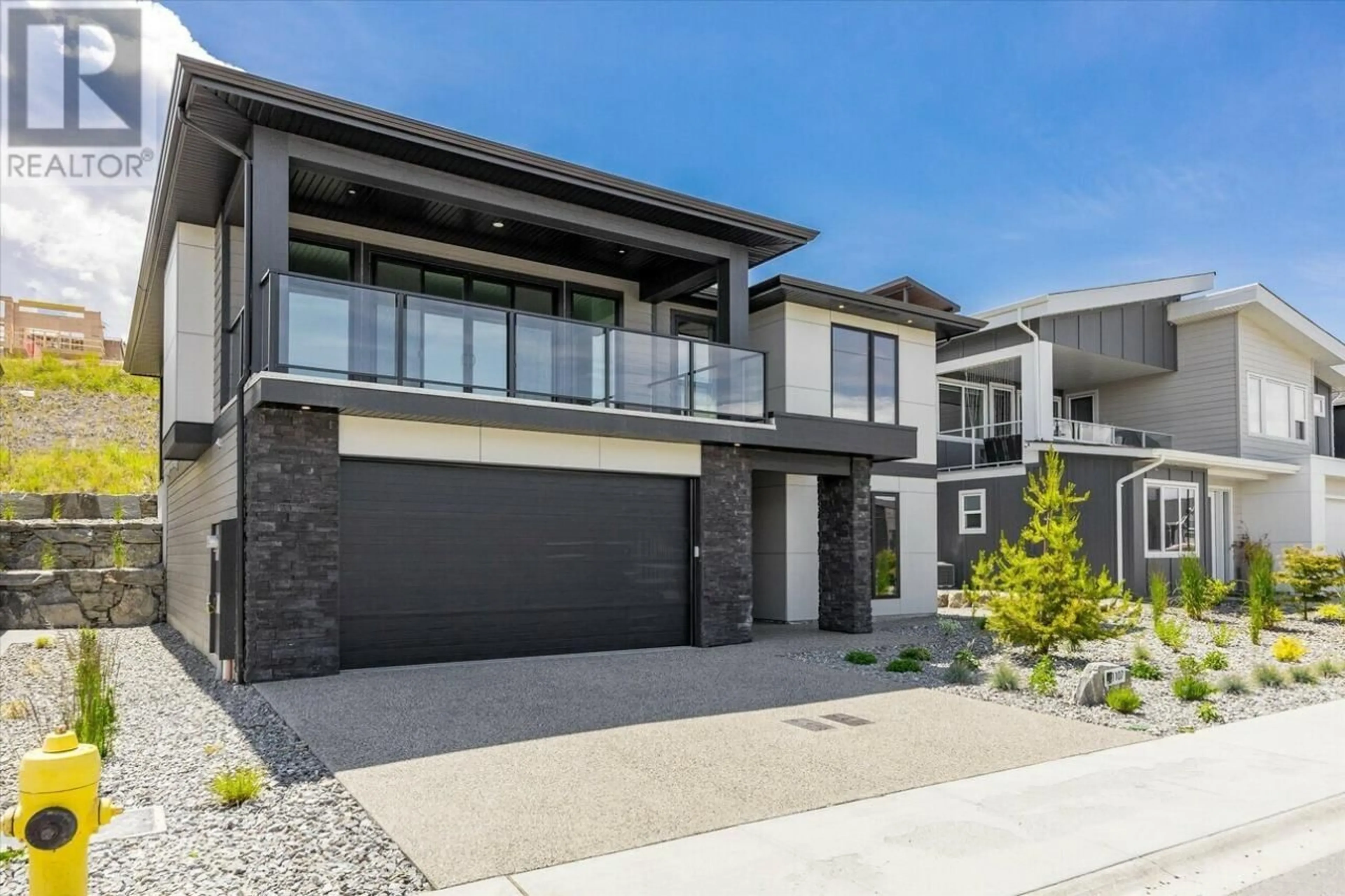 Home with brick exterior material, street for 1107 COLLINSON COURT, Kelowna British Columbia V1W0C3