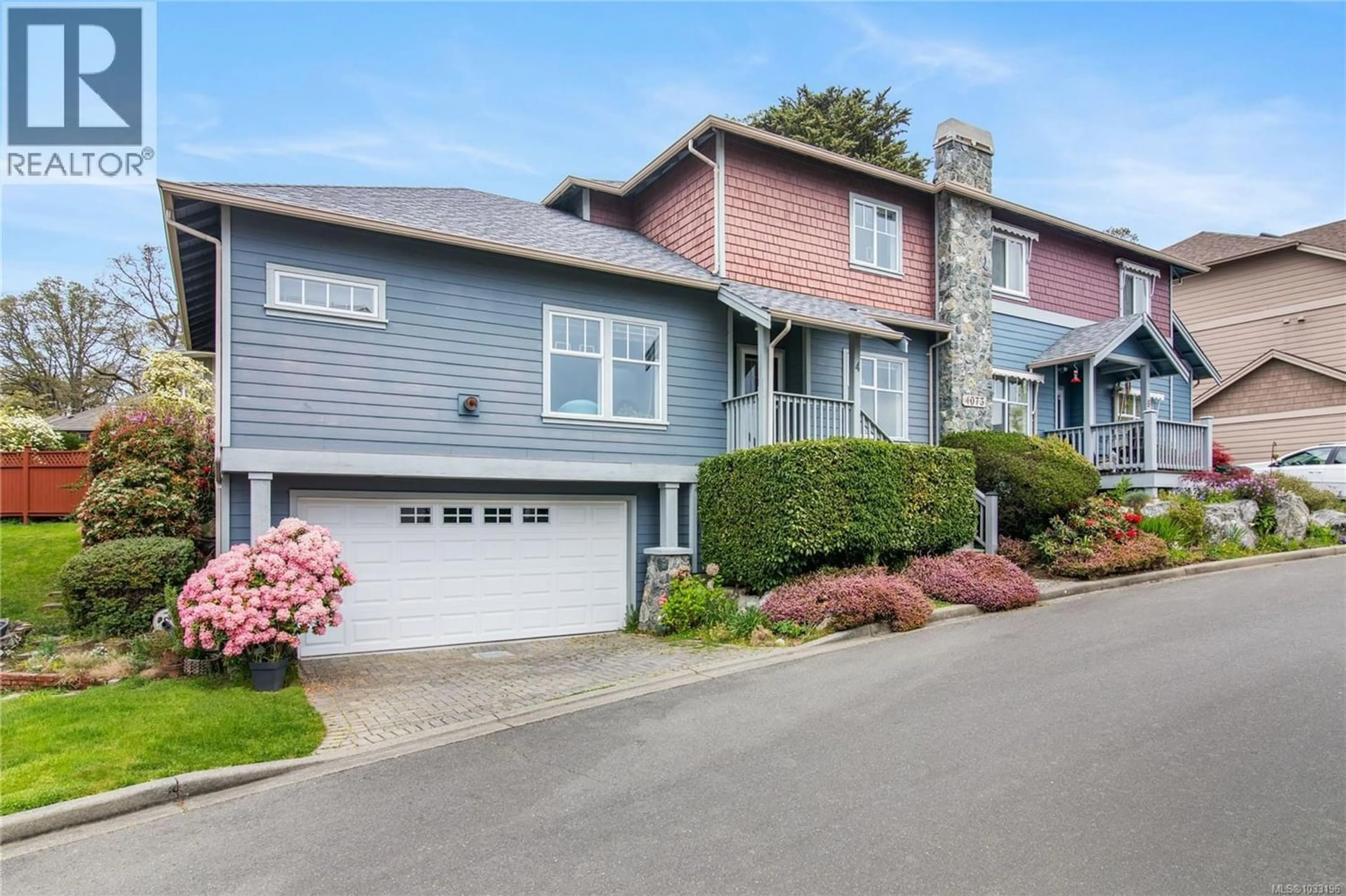 Home with vinyl exterior material, street for 4 - 4073 BLACKBERRY LANE, Saanich British Columbia V8X5J5