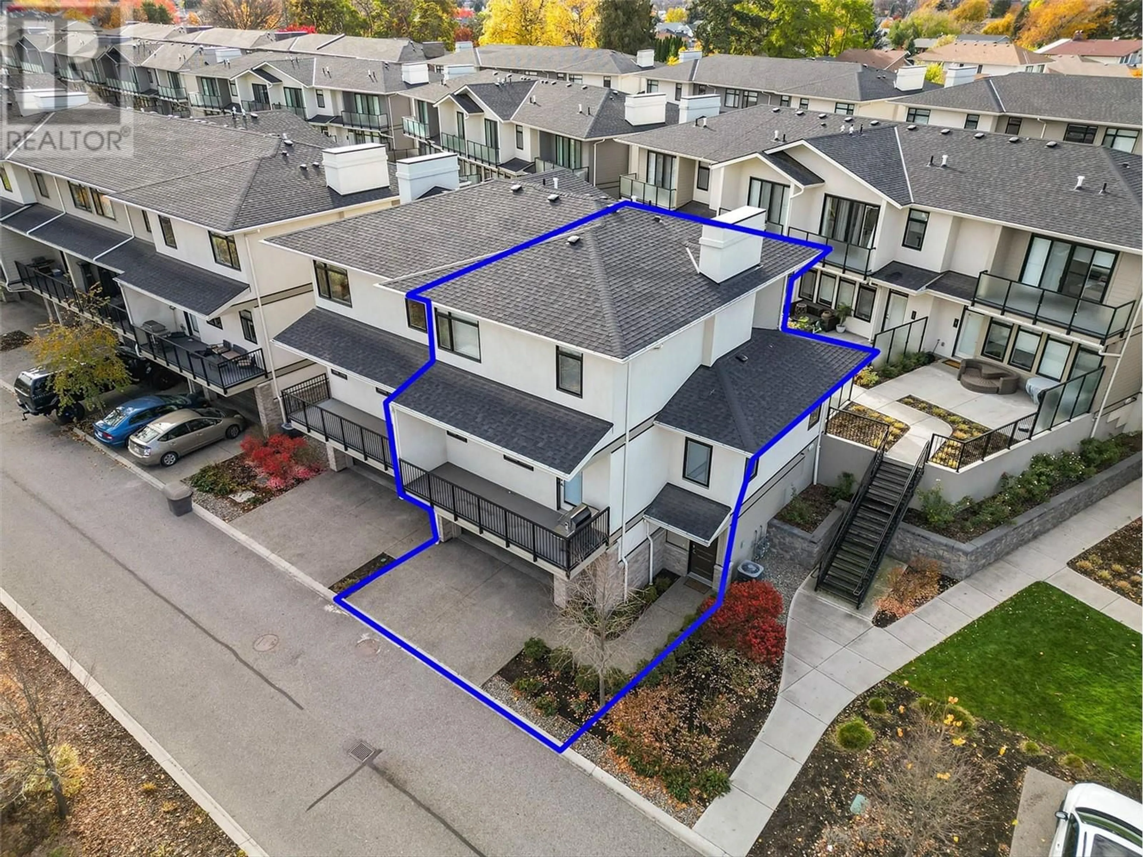 A pic from outside/outdoor area/front of a property/back of a property/a pic from drone, street for 1102 Cameron Avenue Unit# 102, Kelowna British Columbia V1Y0B2