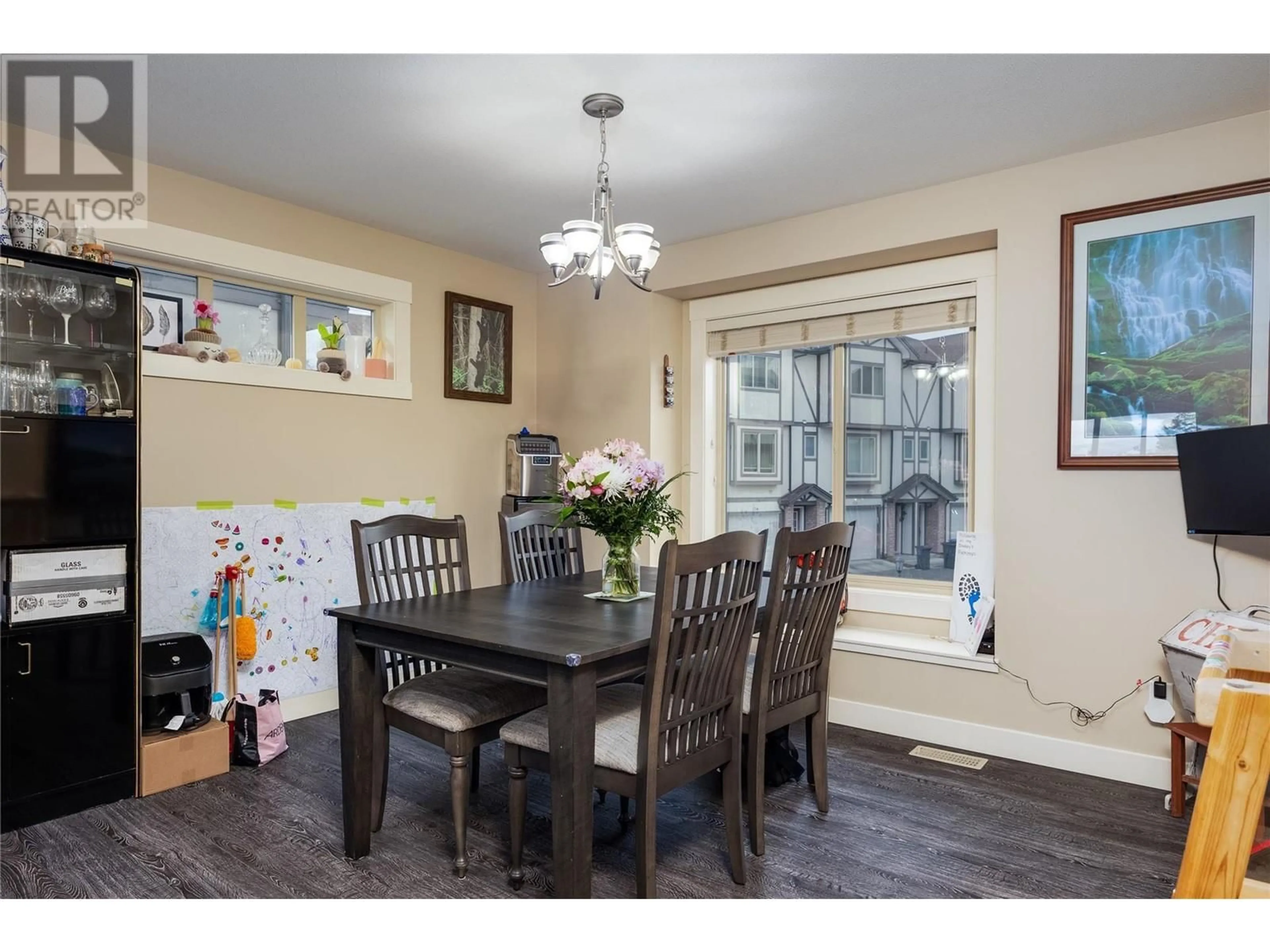 Dining room, wood/laminate floor for 1651 Lynrick Road Unit# 108, Kelowna British Columbia V1P1R4