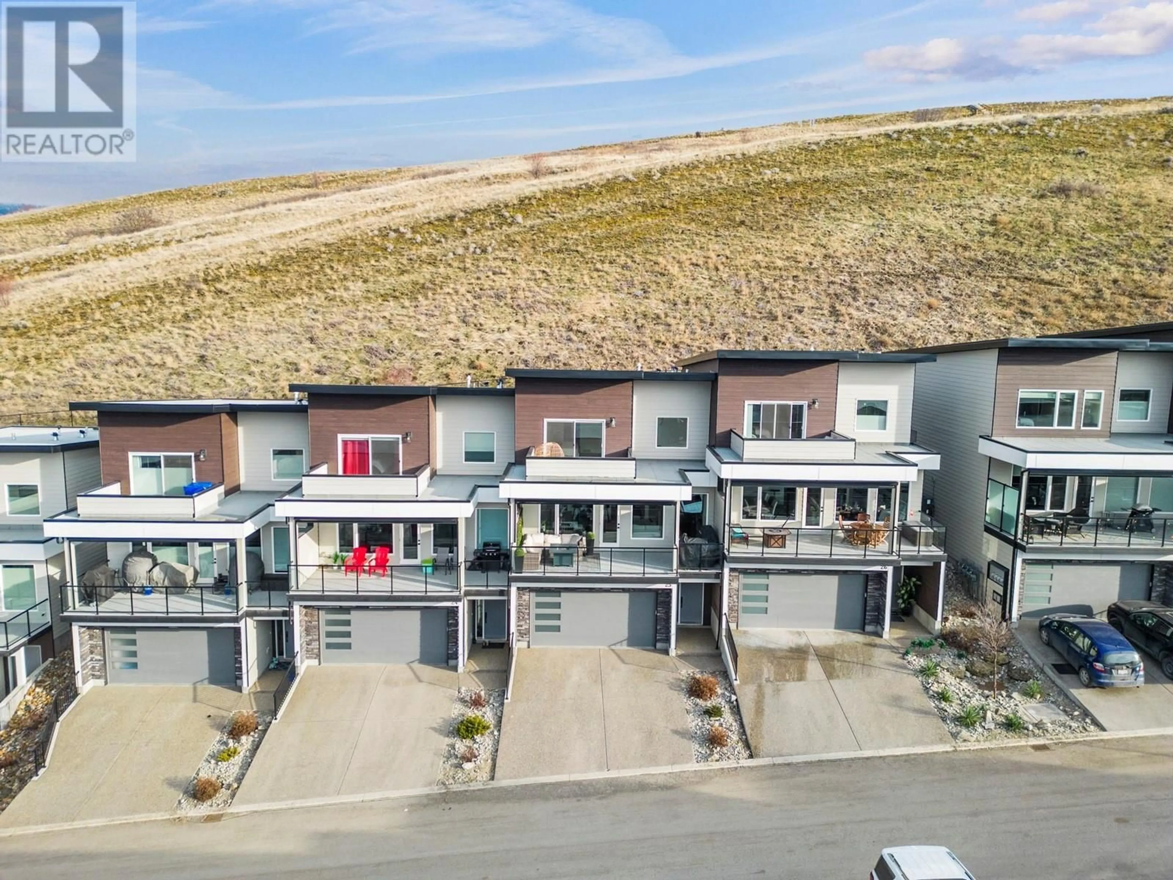 A pic from outside/outdoor area/front of a property/back of a property/a pic from drone, street for 1000 Mt. Robson Place Unit# 25, Vernon British Columbia V1B4G2