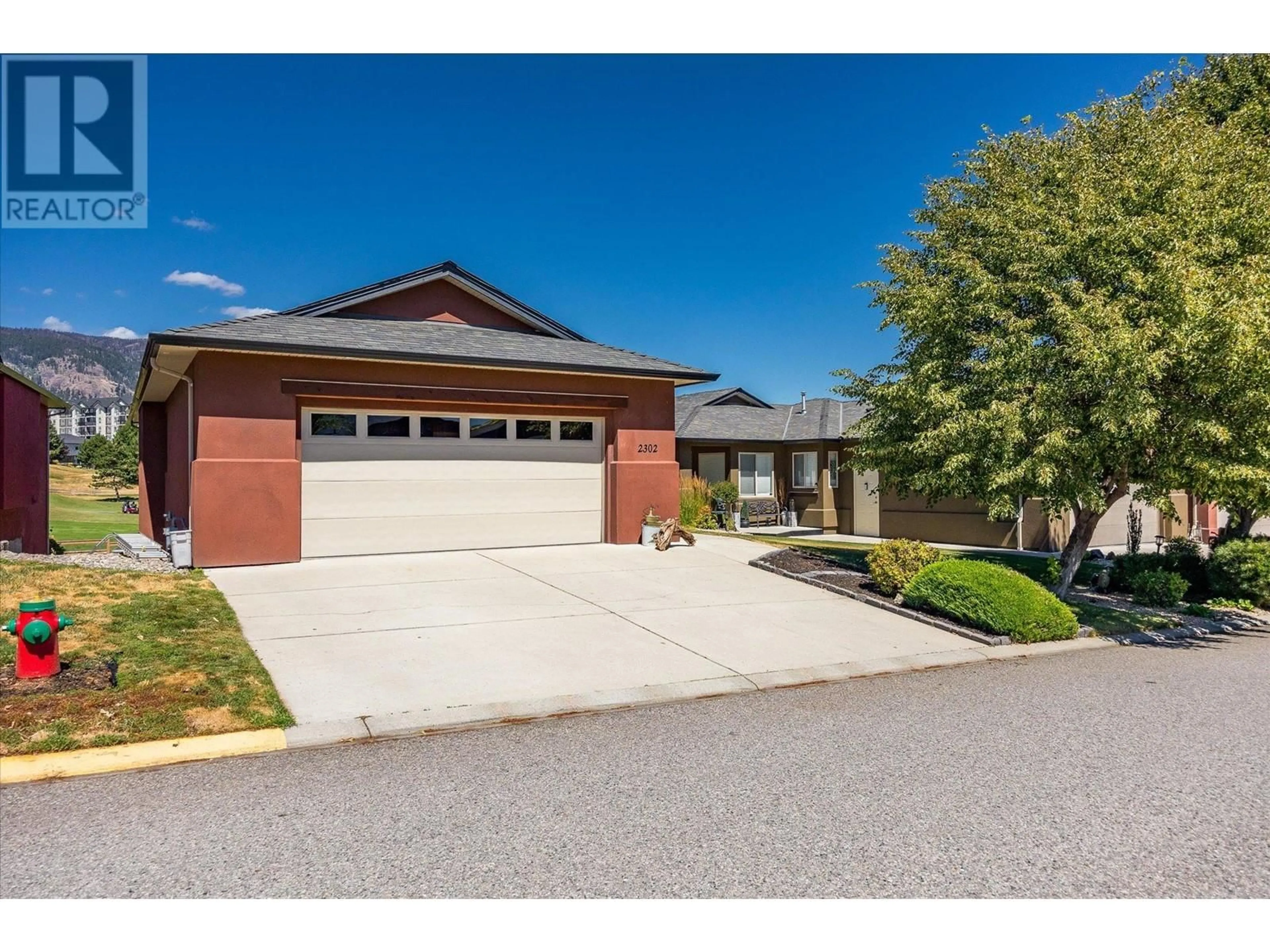 Home with brick exterior material, street for 2302 Pine Vista Place, West Kelowna British Columbia V4T2Y1