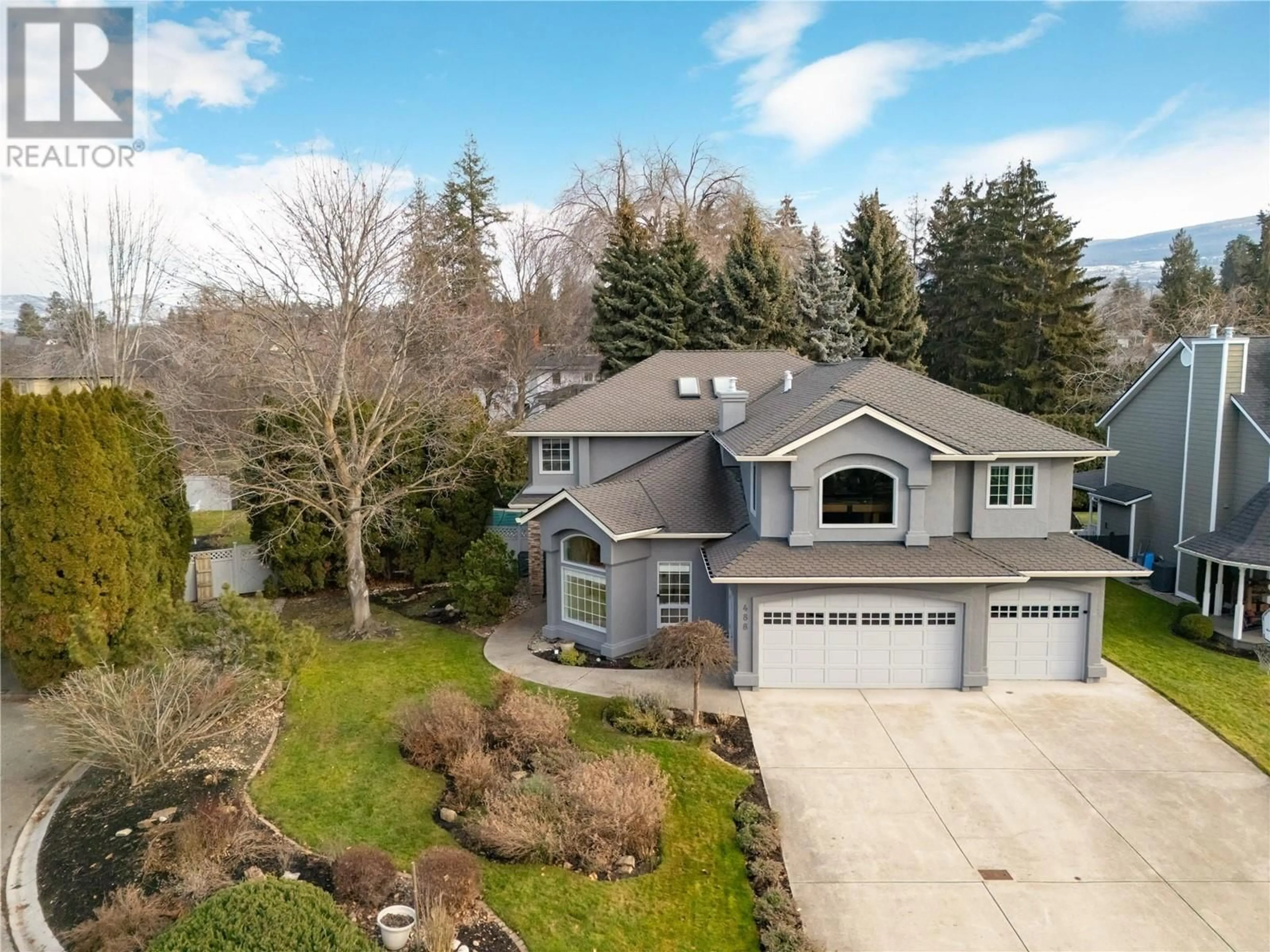 A pic from outside/outdoor area/front of a property/back of a property/a pic from drone, street for 488 Carona Crescent, Kelowna British Columbia V1W3C6