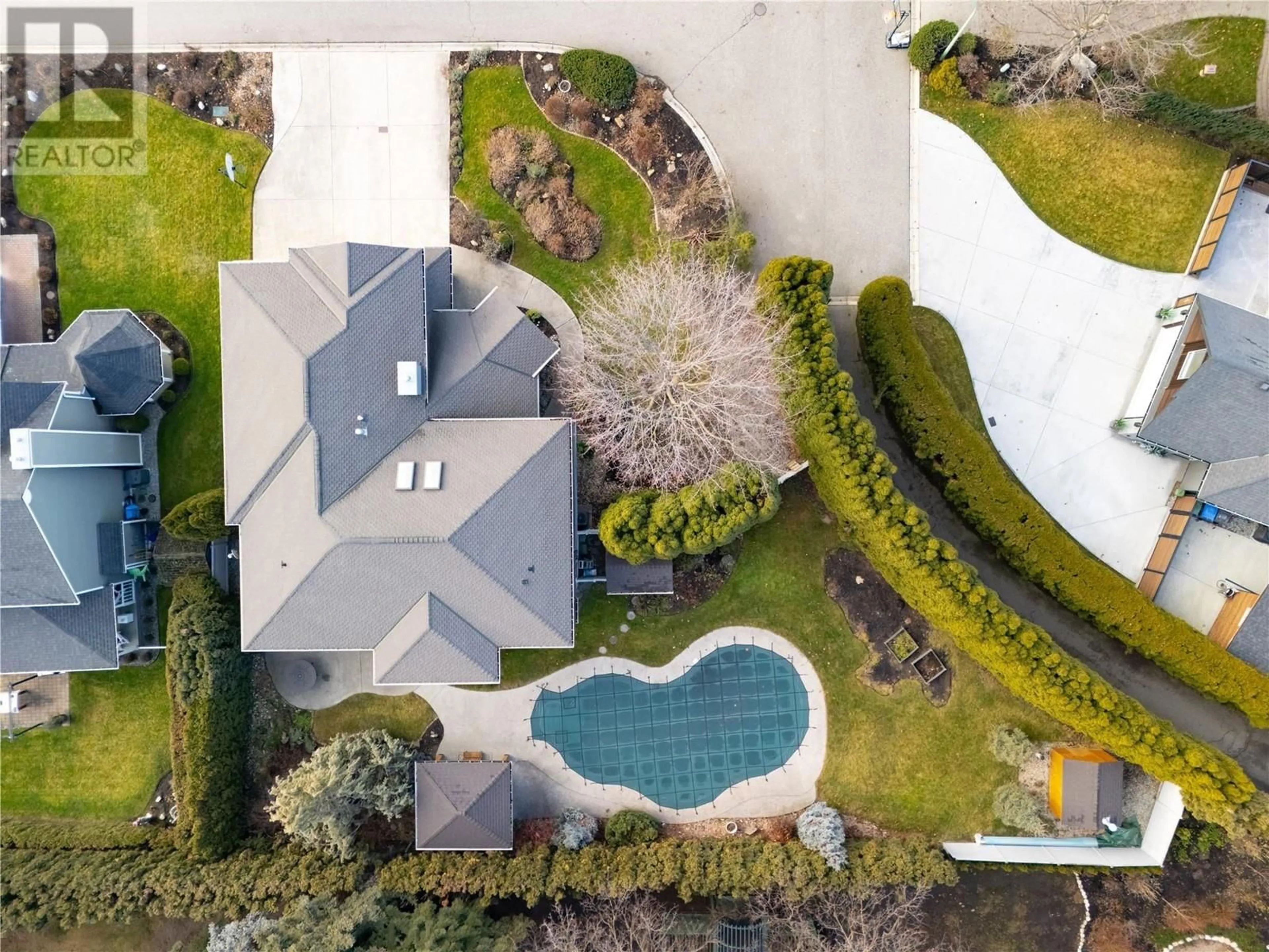 A pic from outside/outdoor area/front of a property/back of a property/a pic from drone, street for 488 Carona Crescent, Kelowna British Columbia V1W3C6